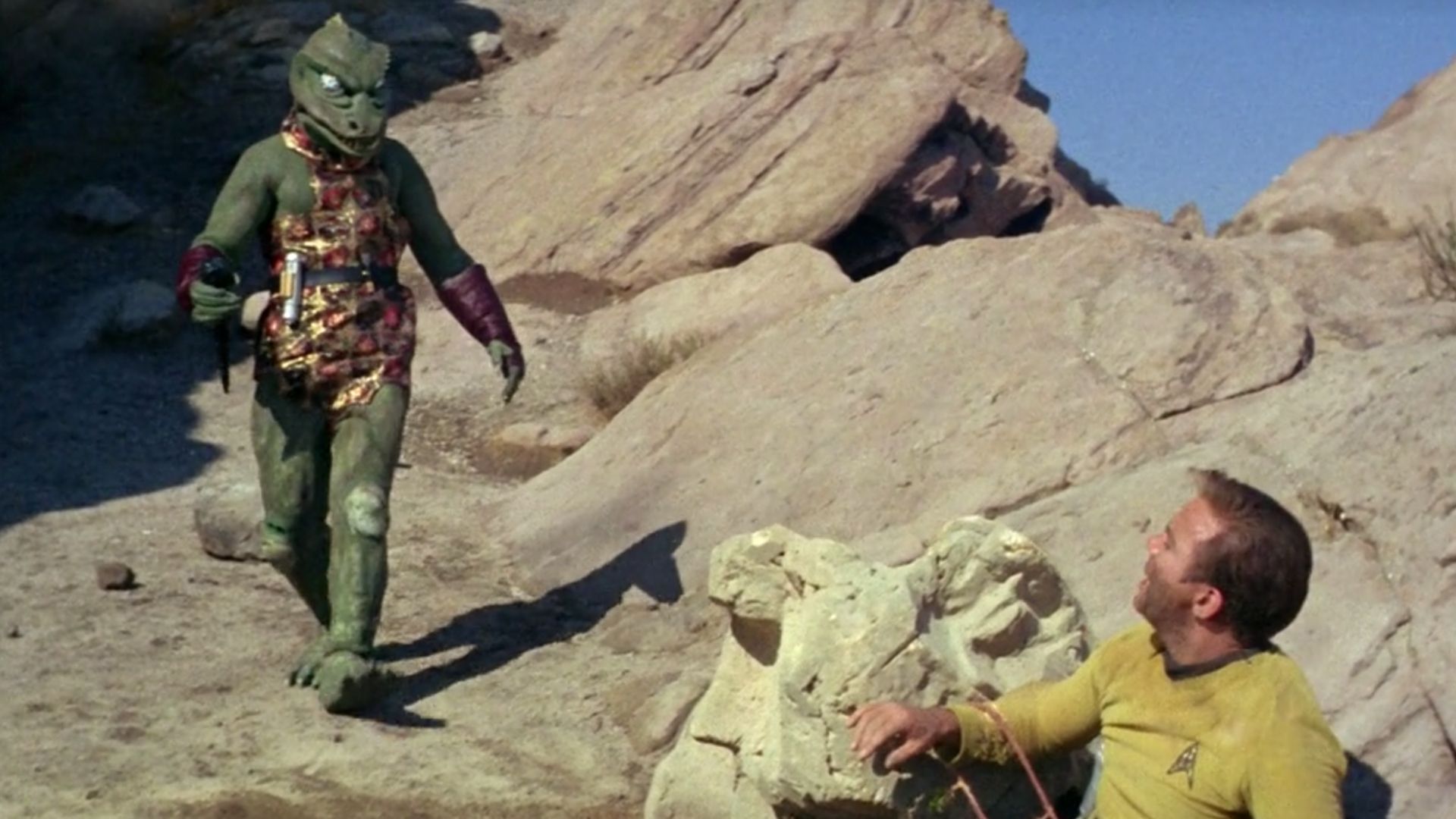 <p>                     <strong>Season 1, Episode 18</strong>                   </p>                                      <p>                     <strong>Original airdate:</strong> January 19, 1967                    </p>                                      <p>                     Arena features one of Star Trek’s most frequently visited recurring themes: humanity’s propensity for violence. An unknown vessel fires upon the Enterprise, which gives chase. Both ships venture into the territory of the Metrons, which decide to settle the matter by pitting Kirk and the other vessel’s captain against each other in one-on-one combat. The winner’s ship gets to go free, the loser, not so much.                    </p>                                      <p>                     The other captain is the reptilian Gorn who Kirk fells after cobbling together a bazooka out of bamboo and rocks; if you were ever wondering where the “rudimentary lathe” joke from Galaxy Quest came from, now you know. When Kirk spares the Gorn’s life, the Metrons decide maybe there’s hope for humanity after all (another constant Star Trek refrain) and allow both ships to go free.                     </p>