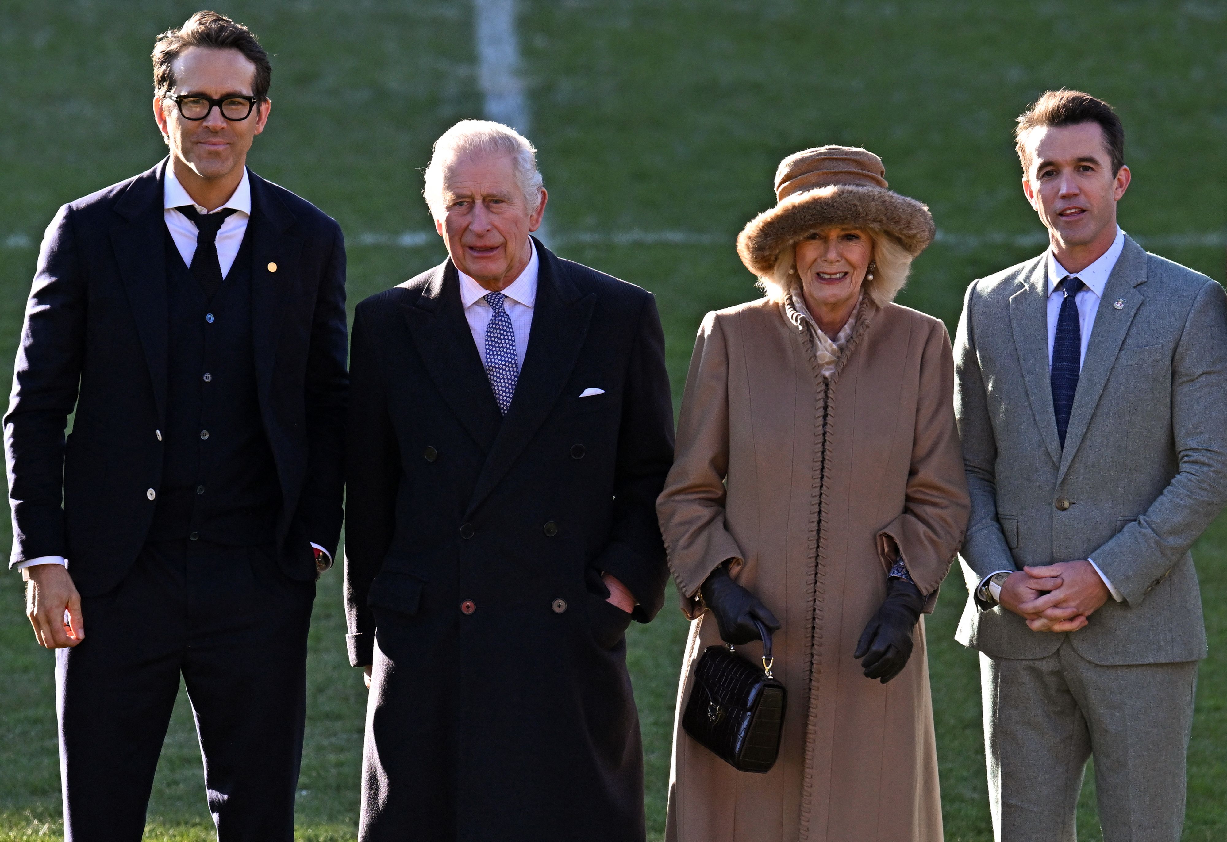 <p>King Charles III and his wife, Queen Consort Camilla, met American actors <a href="https://www.wonderwall.com/celebrity/profiles/overview/ryan-reynolds-390.article">Ryan Reynolds</a> and Rob McElhenney -- who are the co-chairmen of the professional soccer team Wrexham AFC -- during a visit to the Wrexham Association Football Club's Racecourse Ground on Dec. 9, 2022, to learn about the redevelopment of the club as part of their royal visit to Wrexham, Wales. Ryan posted a pic of himself with the king on Instagram and referenced his Wrexham documentary series, cheekily captioning his post, "Welcome to Wrexham Season 2: Charles in Charge."</p>