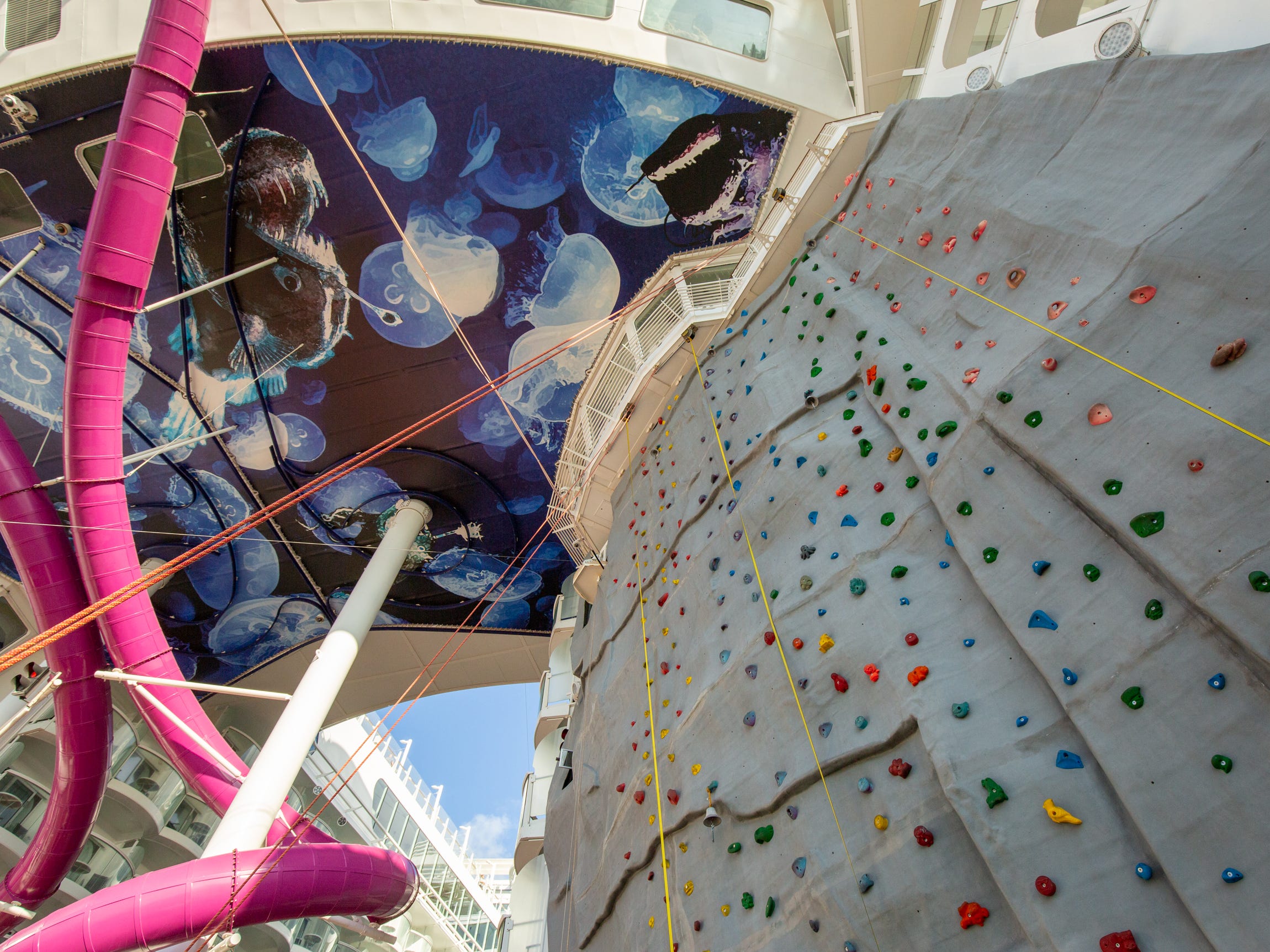 Towards the end of the Boardwalk, two large rock climbing walls frame the Aqua Theater.