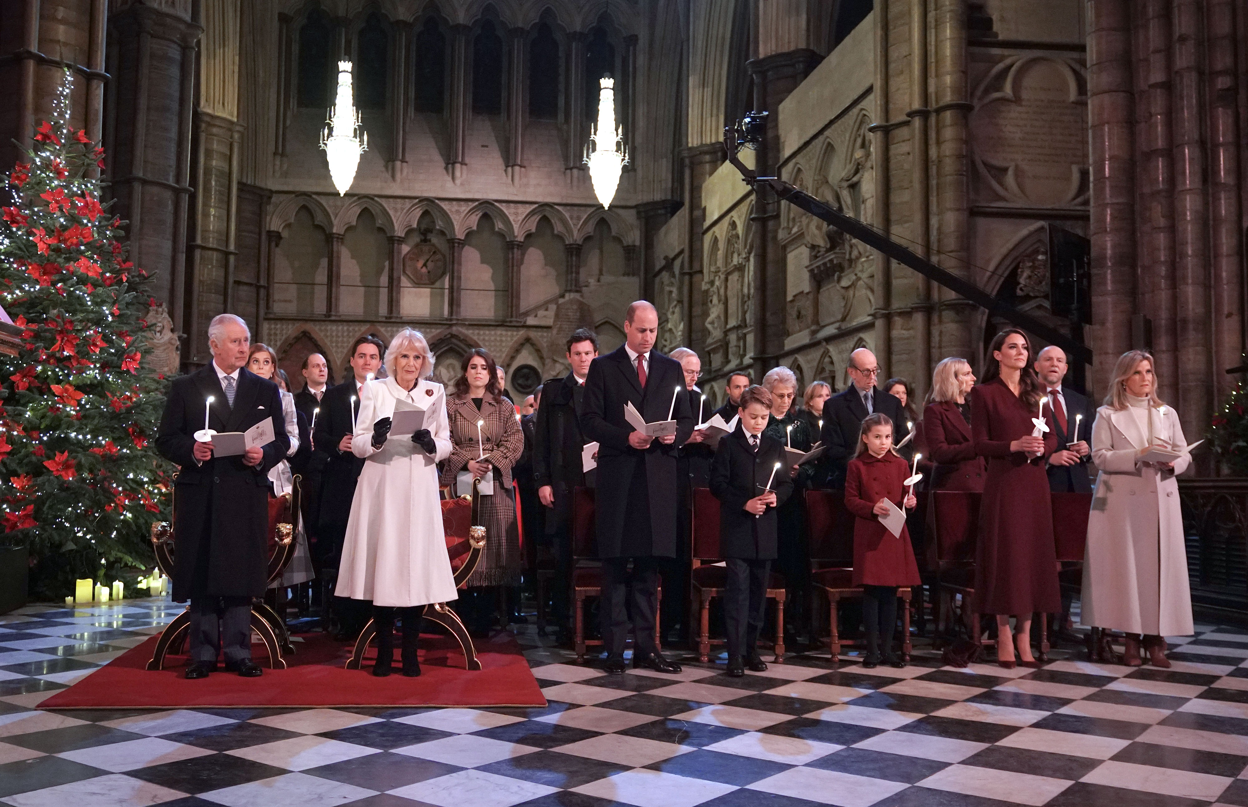 <p>King Charles III and Queen Consort Camilla scored throne-like chairs as they enjoyed Princess Kate's Together at Christmas carol service at Westminster Abbey in London on Dec. 15, 2022. They were seated alongside Prince William, Prince George, Princess Charlotte, Kate and Sophie, Countess of Wessex in the front row, with less senior royals behind them.</p>