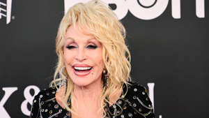 Dolly Parton and her husband Carl Dean have been married for 56 years after first meeting a laundromat on the first day that the future country legend moved to Nashville, Tennessee. Dean's public absence over the years had led to speculation that he is imaginary, which Parton addressed in a 2020 interview. Theo Wargo/Getty Images for The Rock and Roll Hall of Fame