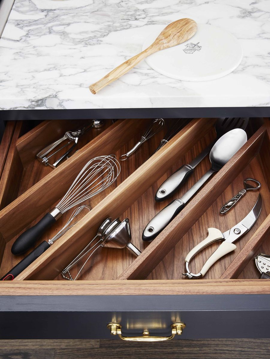 <p>The drawers in Sallick's kitchen are lined with dividers on the diagonal (to accommodate larger items) that keep kitchen and prep tools organized and at the ready.</p>