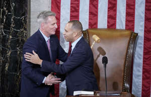 Hakeem Jeffries (D-N.Y.) hugs Kevin McCarthy (R-Calif.) after handing him the speaker’s gavel.