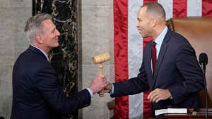 Incoming House Speaker Kevin McCarthy receives the gavel from House Minority Leader Hakeem Jeffries at the U.S. Capitol on Jan. 7, 2023. AP Photo/Andrew Harnik