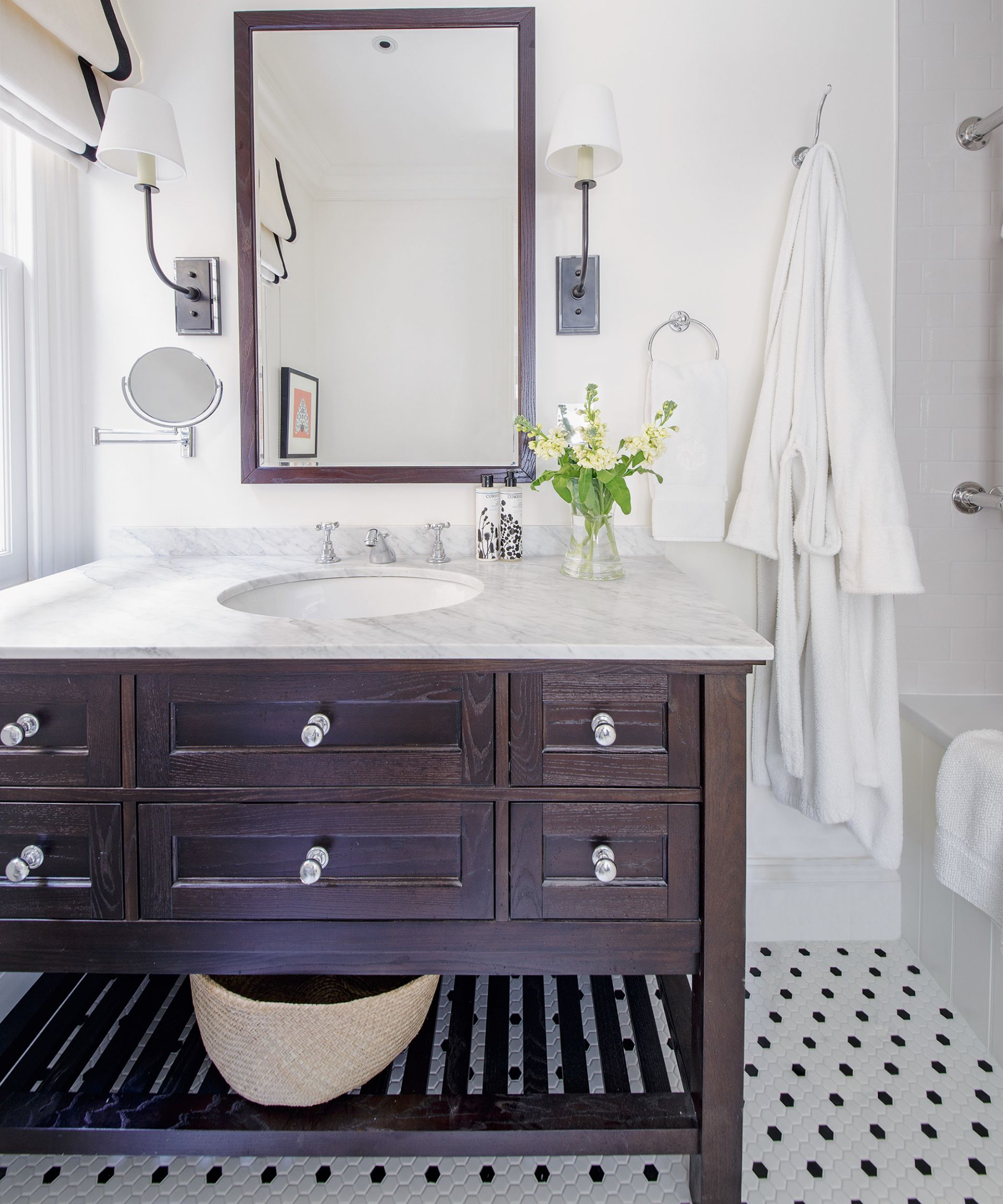 <p>                     Don’t shy away from making a big statement in a small bathroom. Striking furniture will make an impact and hard-working pieces that conceal storage or double up on function will maximize your home’s efficiency.                    </p>                                      <p>                     Natalia Miyar, design director at Helen Green, suggests a bold approach.                    </p>                                      <p>                     ‘Proportion is so important. I like to use large-scale furniture as it makes a space seem bigger and more luxurious,’ she says. ‘The key is to choose carefully. Buy a few large, impactful pieces rather than cluttering a space with a lot of small items.’                    </p>                                      <p>                     Bespoke or standalone shelving is a simple way of creating storage, as well as acting as a room divider. Open bathroom shelves can also inject a sense of spaciousness in compact spaces.                    </p>