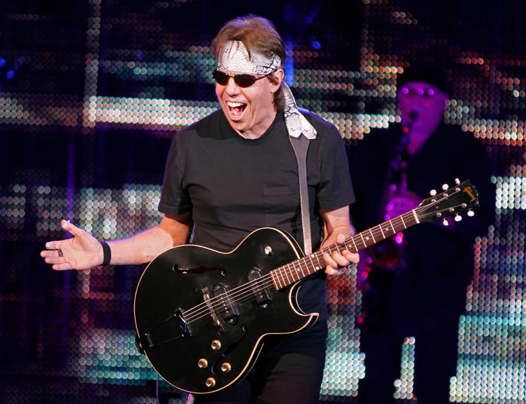 George Thorogood enjoys a receptive crowd response as he and his band the Destroyers perform to a sold out audience at the Northern Lights Theater at Potawatomi Casino on Thursday, August 18, 2011.
