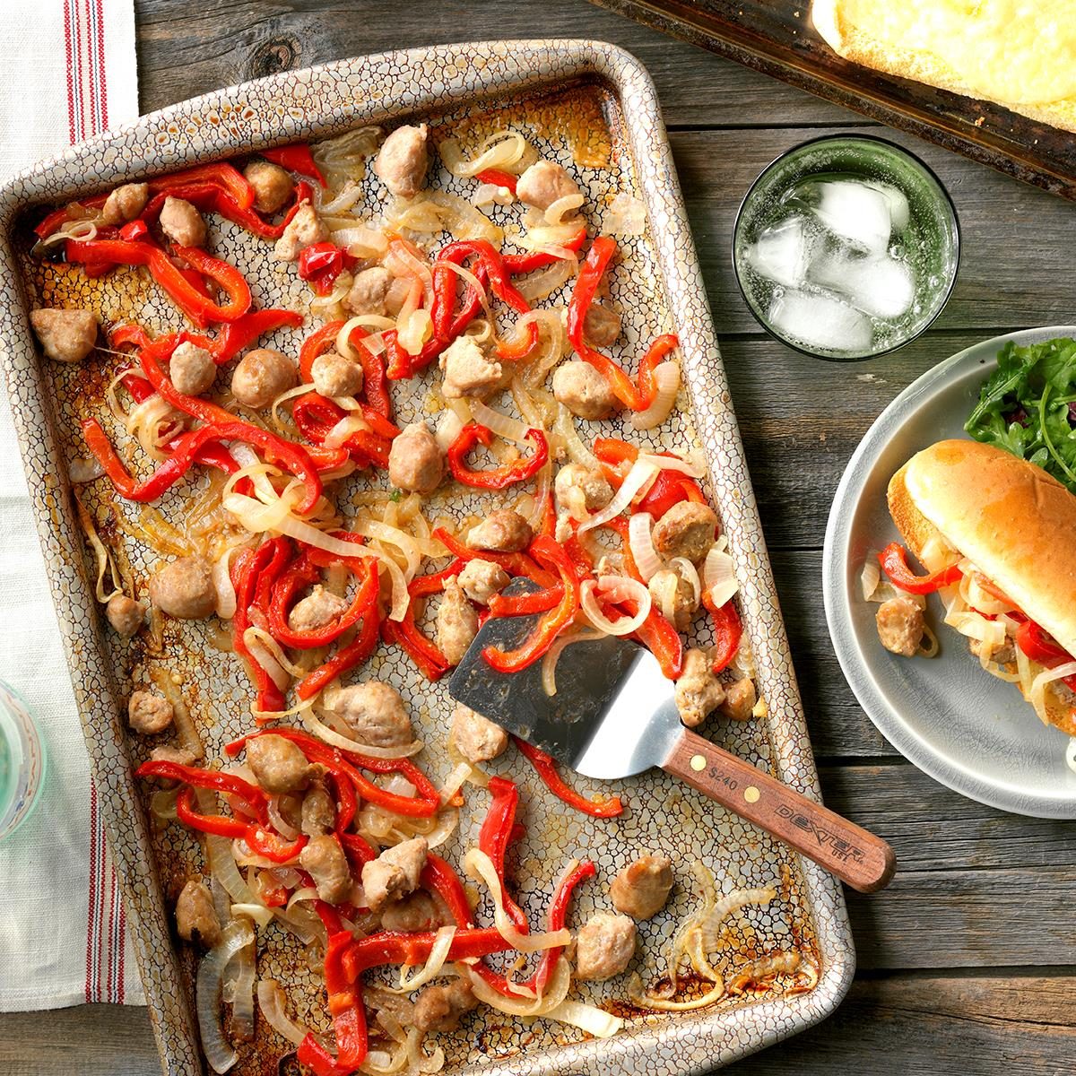 <p>Sausage with peppers was always on the table when I was growing up. Here's how to do it the easy way: Just grab a sheet pan and the ingredients, then let the oven do the work. —Debbie Glasscock, Conway, Arkansas</p> <div class="listicle-page__buttons"> <div class="listicle-page__cta-button"><a href='https://www.tasteofhome.com/recipes/sausage-and-pepper-sheet-pan-sandwiches/'>Go to Recipe</a></div> </div>