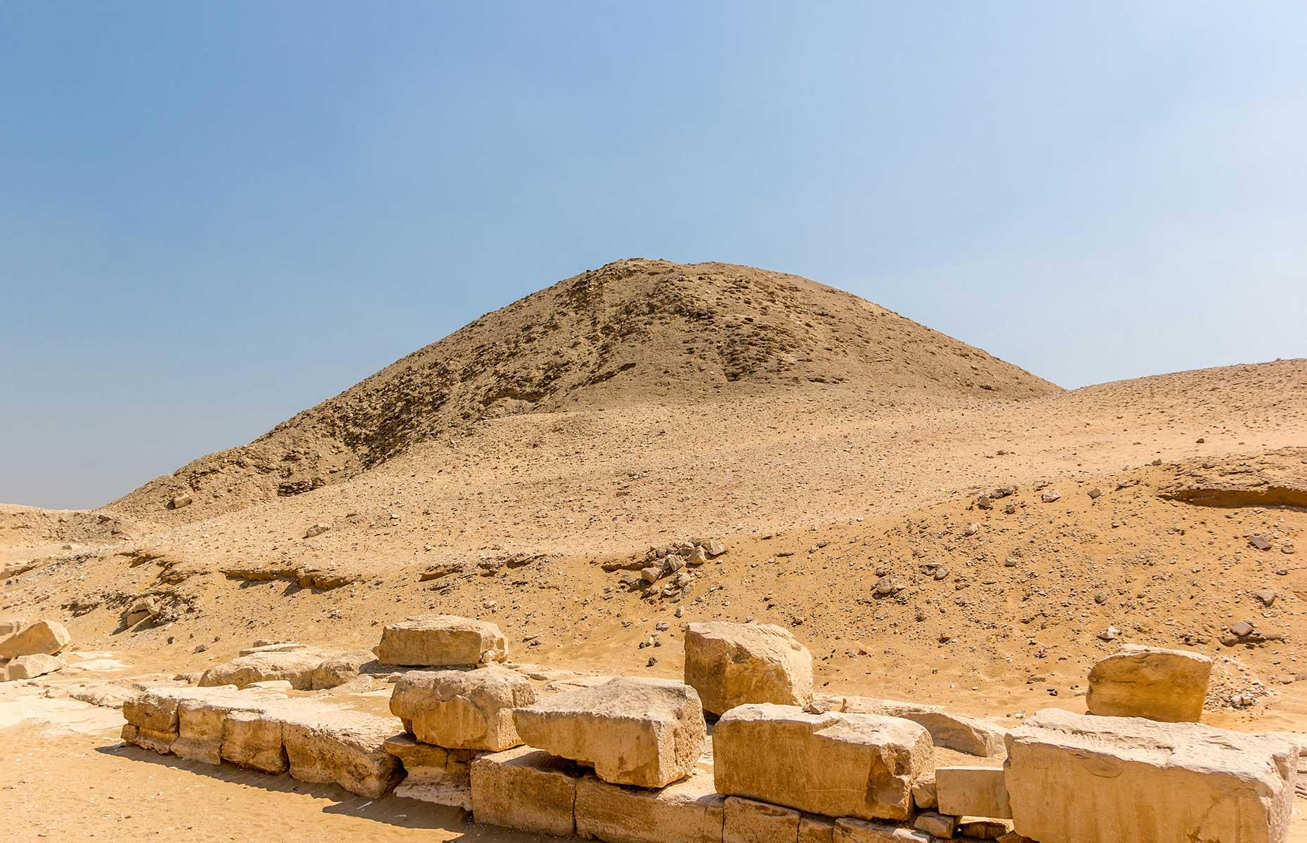 <p>The Teti Pyramid was once 172 feet (52.5m) tall and housed the deceased King Teti, the first pharaoh of the Sixth Dynasty (roughly 2345-2323 BC, although sources vary). Located in Saqqara, the pyramid was constructed with a core of stone blocks encased in limestone. Inside were typical painted reliefs depicting offerings to the gods, plus star-patterned ceilings and three niches which may have held statues of the king. Today the site looks more like a lopsided mound, but it isn't completely collapsed and you can still take a tour inside.</p>