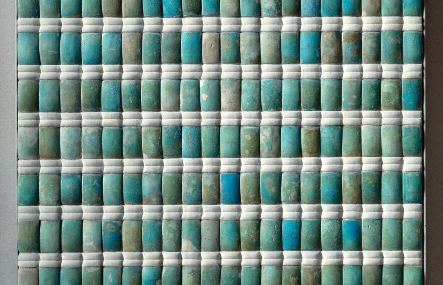 <p>A series of beautiful blue and green tiles were uncovered in the pyramid's galleries and burial chamber. These once lined the walls to imitate the decorative sheets of reeds that would originally have hung in the king’s royal palace, while the blue and green colours symbolised rebirth. The ceramic tiles were created in the faience glazing style, and restored sections are on display at the Imhotep Museum in Saqqara and the Metropolitan Museum of Art in New York.</p>