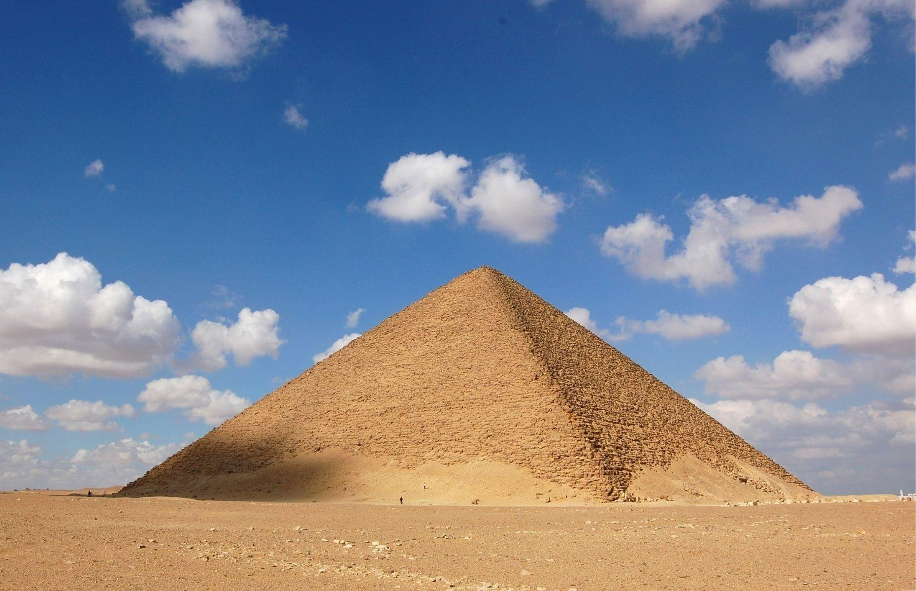 <p>Like the Bent Pyramid, the Red Pyramid is located on the ancient plateau of Dahshur, roughly 25 miles (40km) south of Cairo. Although the pyramid was once covered with white limestone the casing was later removed, exposing the rust-coloured stone beneath and giving it the nickname we use today. Built for the pharaoh Sneferu, exactly how long it took to build is still disputed, but construction is likely to have taken place between 2575 and 2551 BC.</p>