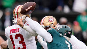 Philadelphia Eagles linebacker Haason Reddick, right, forces a fumble by San Francisco 49ers quarterback Brock Purdy during the first half of the NFC championship Jan. 29, 2023, in Philadelphia. AP Photo/Seth Wenig