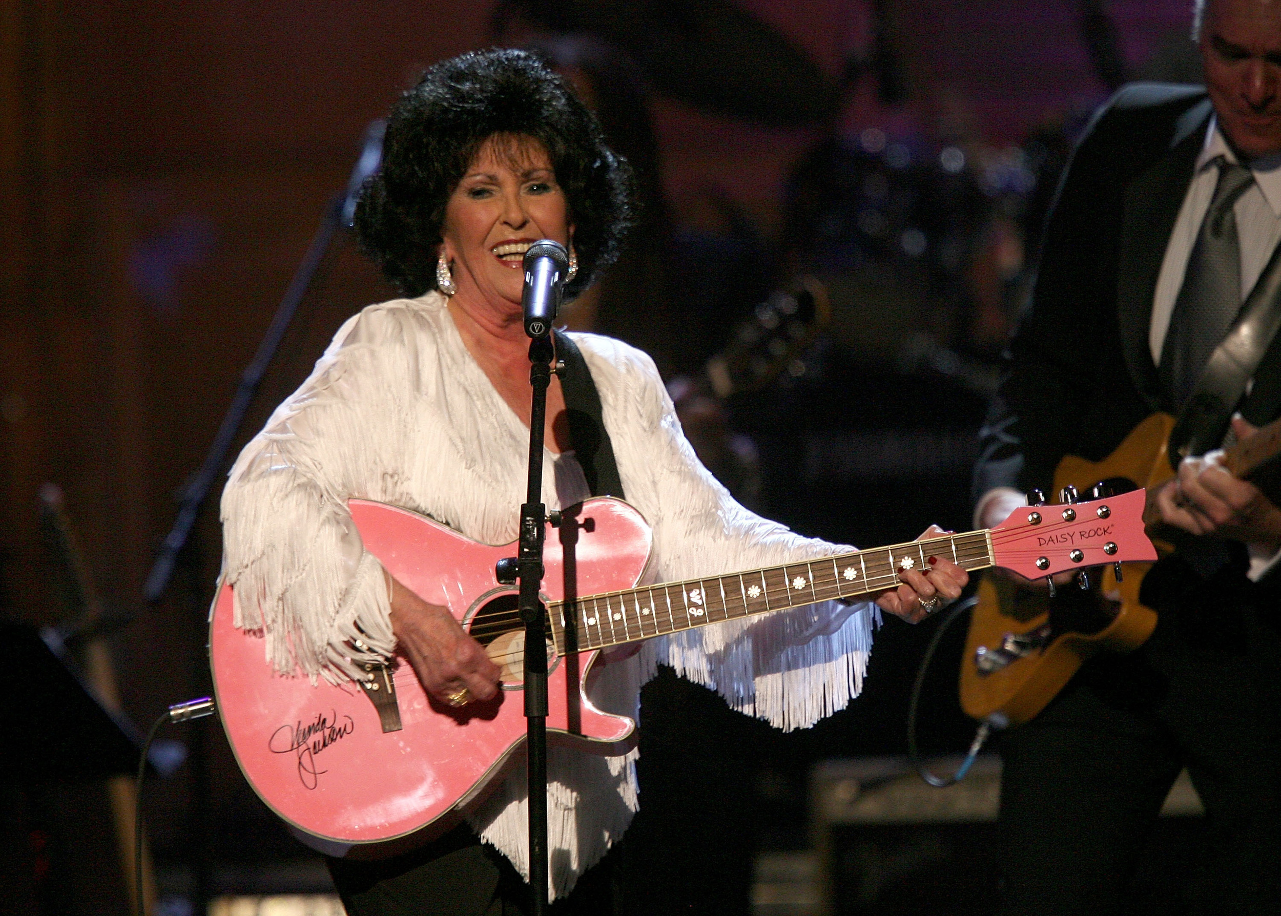 <p>The First Lady of Rockabilly, Ms. Wanda Jackson, has been recording music since the 1950s, when she came up alongside the legendary Elvis Presley. She’s responsible for bringing rockabilly influence to the mainstream with songs like “Fujiyama Mama,” and was a trailblazer for women in the genre who followed her, like Pam Tillis and Rosanne Cash. </p><p>You may also like: <a href='https://www.yardbarker.com/entertainment/articles/25_members_of_famous_bands_who_deserve_more_love/s1__33036248'>25 members of famous bands who deserve more love</a></p>
