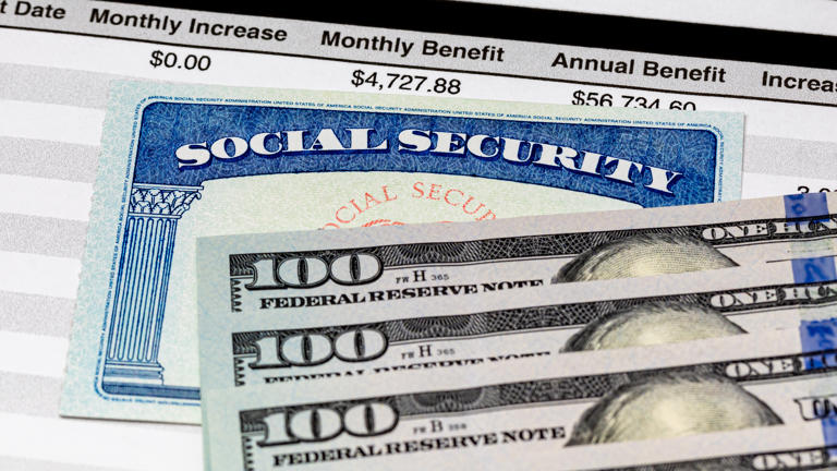 Social Security Card, benefits statement and 100 dollar bills. Social security funding, payment, retirement and federal government benefits concept