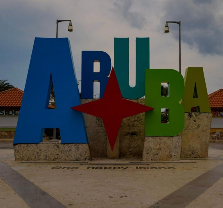 The colorful Aruba - one happy island sign.