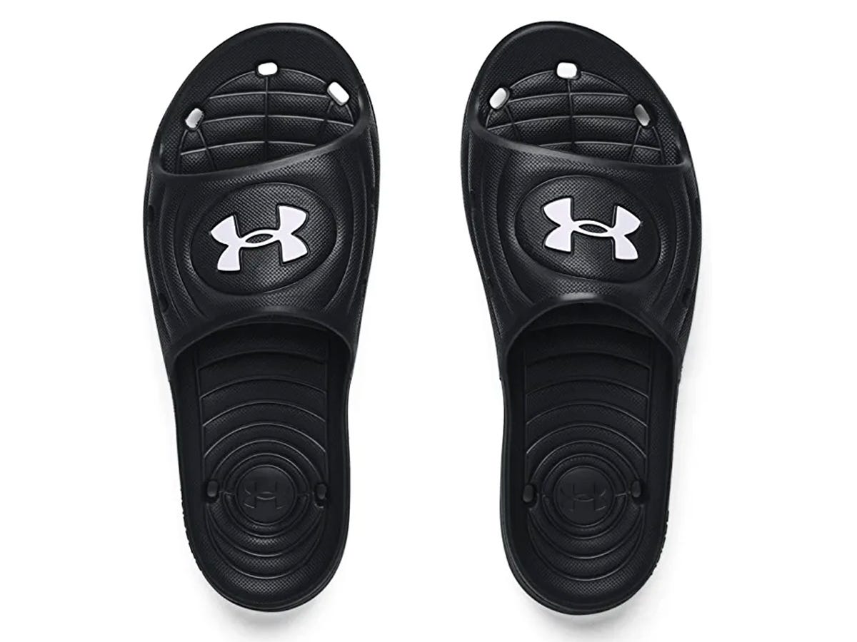 <p><strong>Under Armour Men's Locker IV Slides</strong></p><div class="bi-product-card"><div class="product-card-options"><div class="product-card-option"><div class="product-card-button"><a href="https://affiliate.insider.com?amazonTrackingID=biauto-60354-20&platform=msn_reviews&postID=63b6f493722a68437046c023&site=in&u=https%3A%2F%2Fwww.amazon.com%2Fdp%2FB087DWV97X&utm_source=msn_reviews"><span>$19.95 FROM AMAZON</span></a></div></div><div class="product-card-option"><div class="product-card-button"><a href="https://www.kohls.com/product/prd-4517889/under-armour-locker-iv-mens-slide-sandals.jsp"><span>$22.00 FROM KOHL'S</span></a></div></div><div class="product-card-option"><div class="product-card-button"><a href="https://affiliate.insider.com?amazonTrackingID=biauto-60354-20&platform=msn_reviews&postID=63b6f493722a68437046c023&site=in&u=https%3A%2F%2Fwww.dickssportinggoods.com%2Fp%2Funder-armour-mens-locker-iii-slides-20uarmmlckrvslblkope%2F20uarmmlckrvslblkope&utm_source=msn_reviews"><span>$19.99 FROM DICK'S SPORTING GOODS</span></a></div></div></div></div><p>Get even more comfortable on your next flight by keeping a pair of slides in your carry-on bag. "I love traveling with slides instead of wearing my shoes. It's more comfortable on the plane. I have these slides that I swear by they're lightweight [and] you can put it into your backpack pretty easily," said Adam Boro. This pair from Under Armour is flat enough to tuck in between your laptop and toiletries case. </p>
