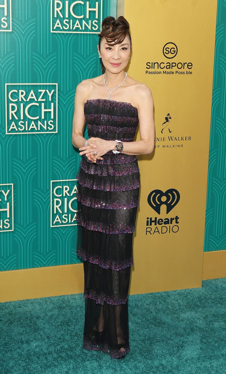 Michelle Yeoh wore a bold orange gown to the Golden Globes