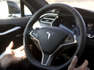 Autopilot features are demonstrated in a Tesla Model S during a Tesla event in Palo Alto, California October 14, 2015.