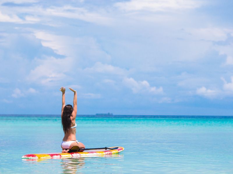 Paddleboard in the water of Grand Cayman