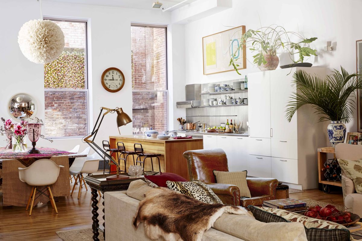 <p>In this New York loft designed by <a href="https://katieleede.com/">Katie Leede</a>, the kitchen, which occupies a corner of the airy living space, lives much larger than it actually is, thanks to tall ceilings and a bright white palette. Streamlined storage in the wall built-ins and the large island allow for greater functionality and versatility: Leede uses the island for work during the day, dinner at night, and entertaining on the weekends.</p>