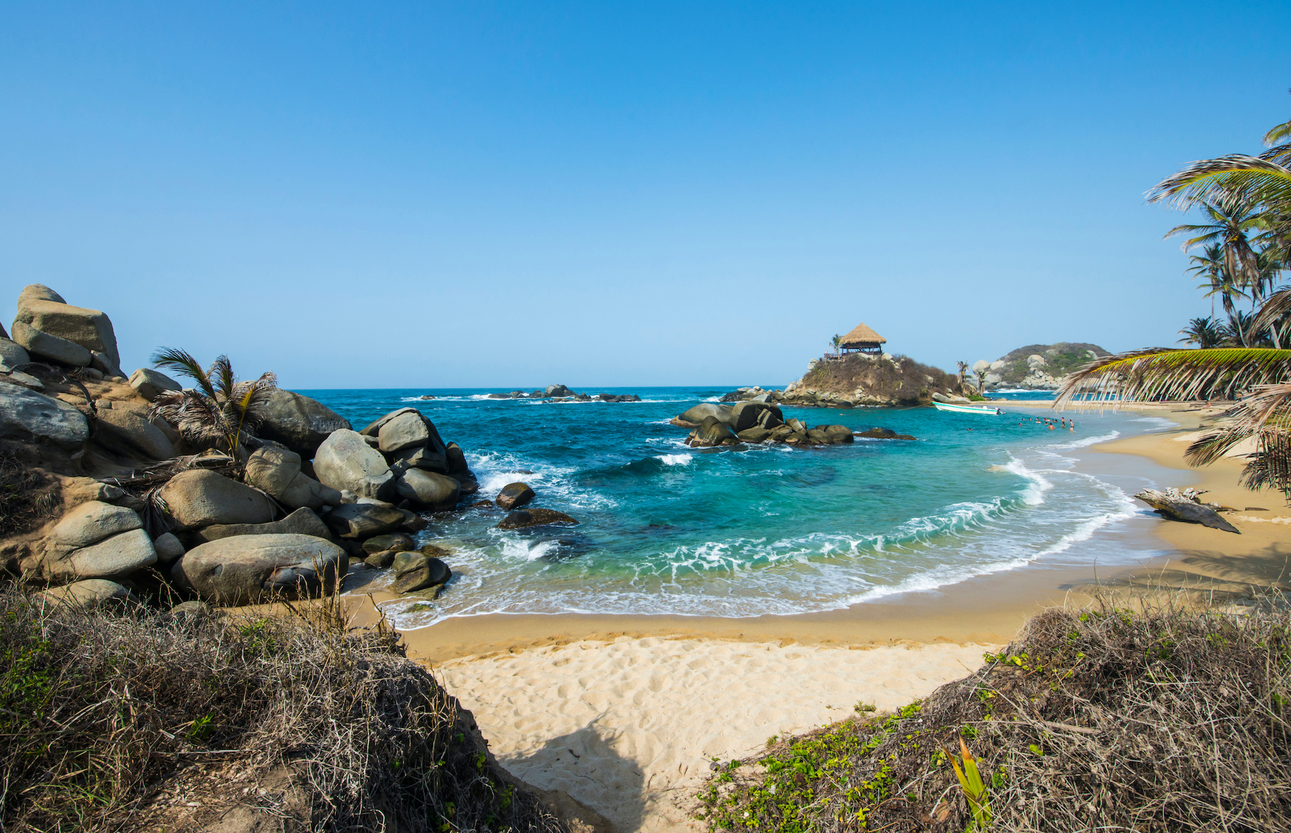 Located in northern Colombia, <a href="https://www.parquetayrona.com/en/" rel="noreferrer noopener">Tayrona National Park</a> is a protected area featuring wild landscapes, coastal Caribbean lagoons, and flourishing nature. It has some of the most spectacular beaches in the country (they’re also great for snorkelling!) and the impressive archeological site of Pueblito.