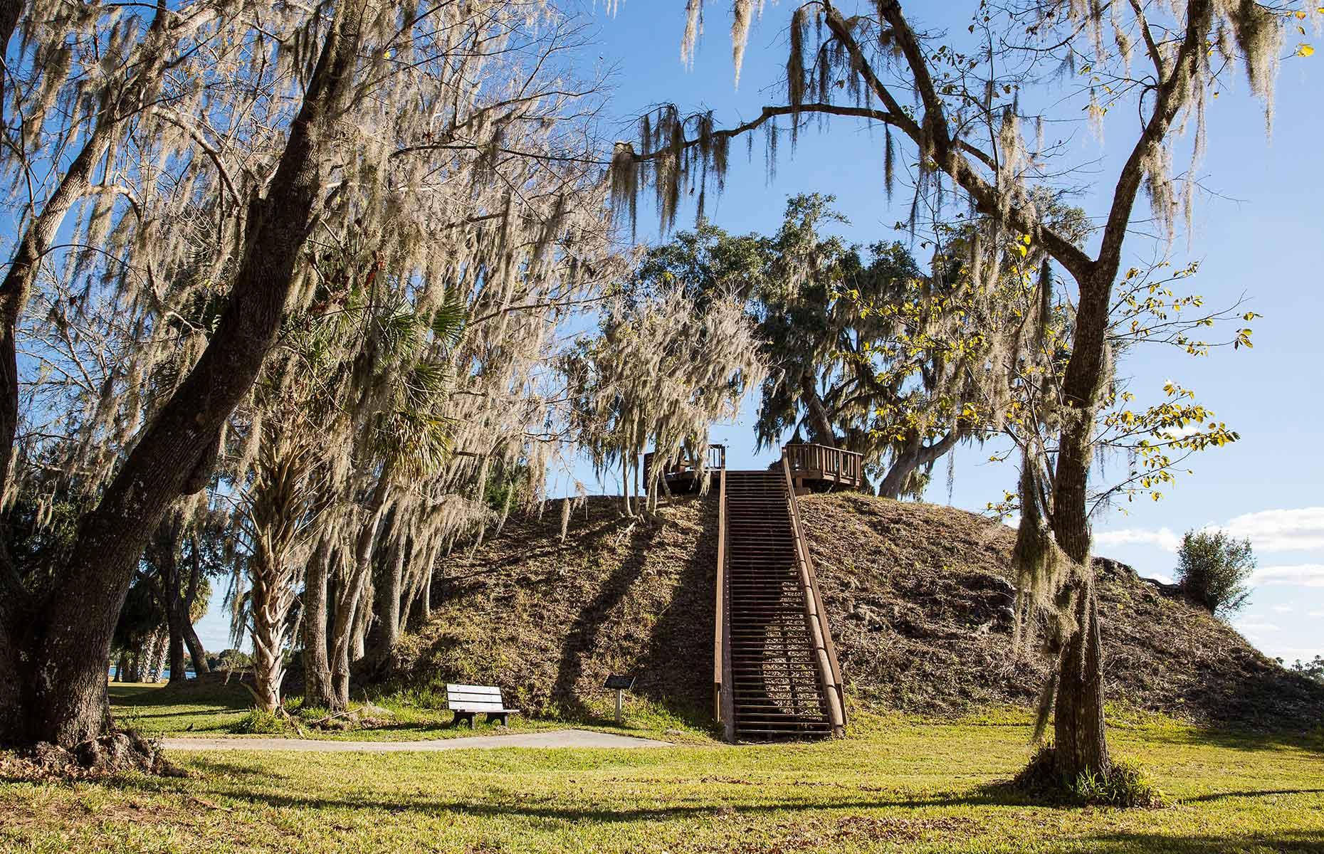 <p>The incredible <a href="https://www.floridastateparks.org/parks-and-trails/crystal-river-archaeological-state-park">Crystal River Archaeological State Park</a> boasts Native American burial mounds, temple mounds, a plaza area, a village and a shell midden (rubbish heap). The site is believed to date back as far as <a href="https://www.discovercrystalriverfl.com/events/moon-over-the-mounds-7/">1000 BC</a>, with the largest mound, Mound A (pictured), being built around AD 600 out of foraged oyster shells for a high-ranking member of the community. As well as exploring the museum and interpretive exhibits, you can ascend the <a href="http://floridanaturecoast.org/County/Citrus/CrystalRiverArchaeological/CrystalRiverArchaeological">'Stairway to Heaven'</a> of Mound A.</p>