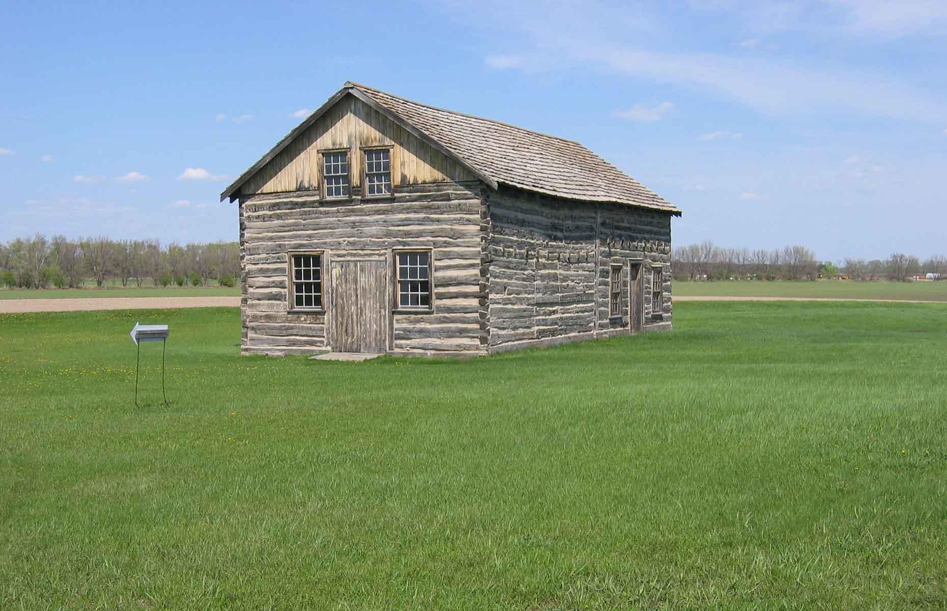 <p>Prominent Metis (mixed European and Native American) fur trader Antoine Gingras constructed <a href="https://www.history.nd.gov/historicsites/gingras/index.html">this oak log trading post</a> in 1844 using dovetailed and pegged joints. The original logs are still exposed today (pictured), and remain fragile. However, the second building on the site, the family home, has been restored to its colourful former glory. Step inside to read the interpretative panels telling you more about this historic place, as well as about Métis culture.</p>