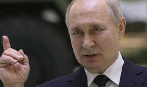 Vladimir Putin also pictured with suspected track marks from IV treatment on the back of his hand