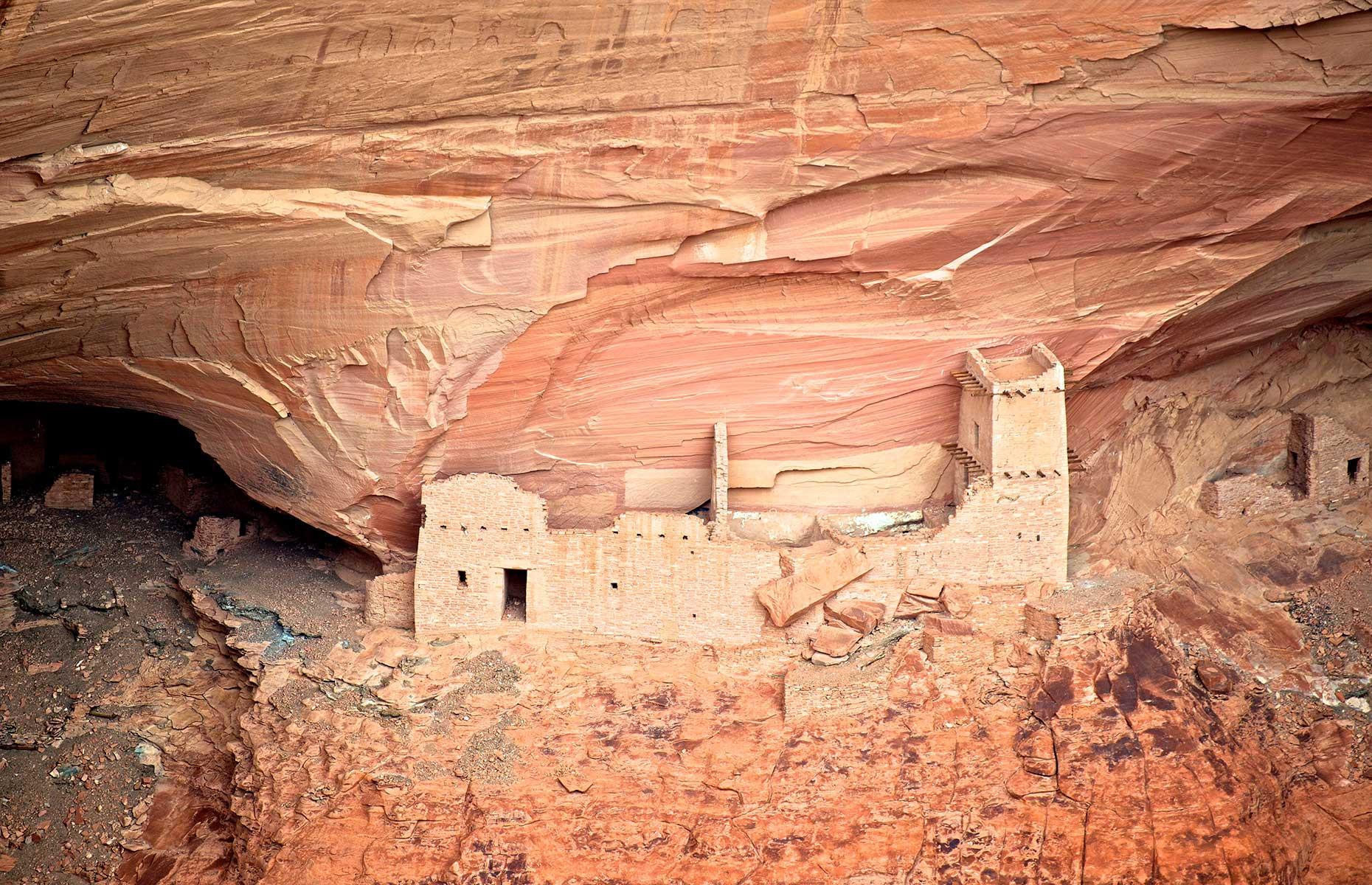 <p>Arizona is home to dozens of ancient dwellings, pueblos and ruins. One of the oldest we know of is the <a href="https://www.worldhistory.org/Canyon_de_Chelly/">Mummy Cave</a> in Canyon de Chelly (pictured). Ancient Puebloans built at least 70 rooms here, believed to date back to AD 300, which you can view from the Mummy Cave Overlook on the park's North Rim Drive. Otherwise, the Pueblo Grande Ruins near Phoenix, <a href="https://pueblogrande.org/museum-history/">built around AD 450</a> by the Hohokam people, are also worth seeing, and include a Mesoamerican-inspired ball court the Hohokam once played on. You can also visit the Pueblo Grande Museum and Archaeological Park to enjoy exhibits, a trail system and special events and programs throughout the year.</p>