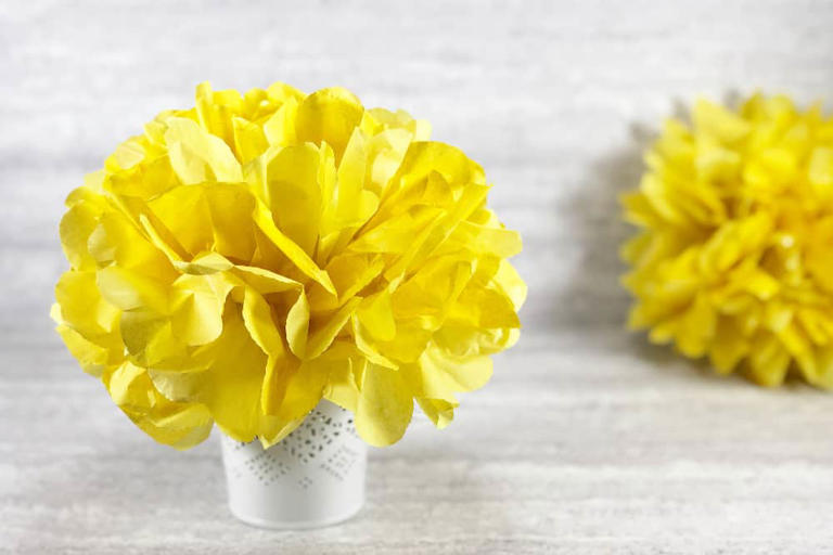 Bring color indoors for any occasion with these easy tissue paper flowers for kids and adults. Here's how to make them!