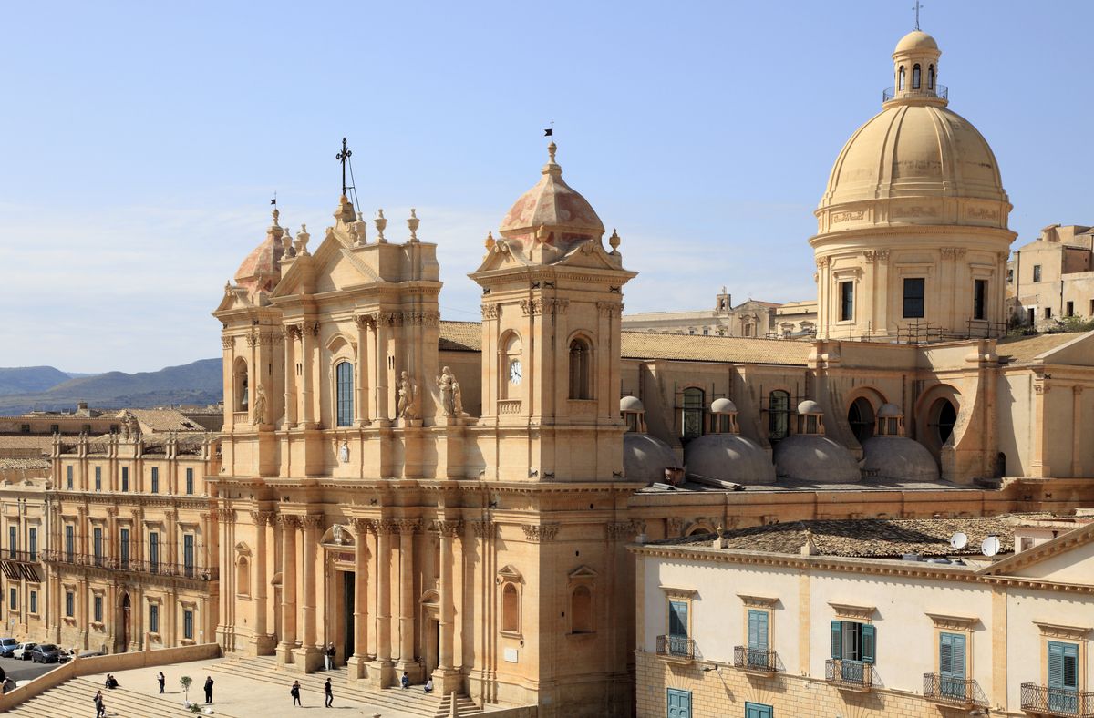 <p>Founder of <a href="https://hotelsabovepar.com/">Hotels Above Par</a> and HAP Concierge Brandon Berkson thinks Noto is the underrated Sicilian town you need to have on your radar. He expanded, “Often overlooked by Taormina-bound travelers (<em>White Lotus</em> season two filmed here), Noto boasts a local-heavy feel, especially during the off season in March. Almost all the town’s Baroque-style buildings comprise limestone, a material that absorbs the sun’s aureate rays and creates a honey-like glow at sunset. The public gardens, Church of Fracesco, and Palazzo Nicolaci di Villadorata are Noto landmarks that deserve your attention."</p><p><a class="body-btn-link" href="https://www.thethinkingtraveller.com/italy/sicily/villas/palazzo-alvear">Where to Stay: Palazzo Alvear Luxury Villas</a></p>