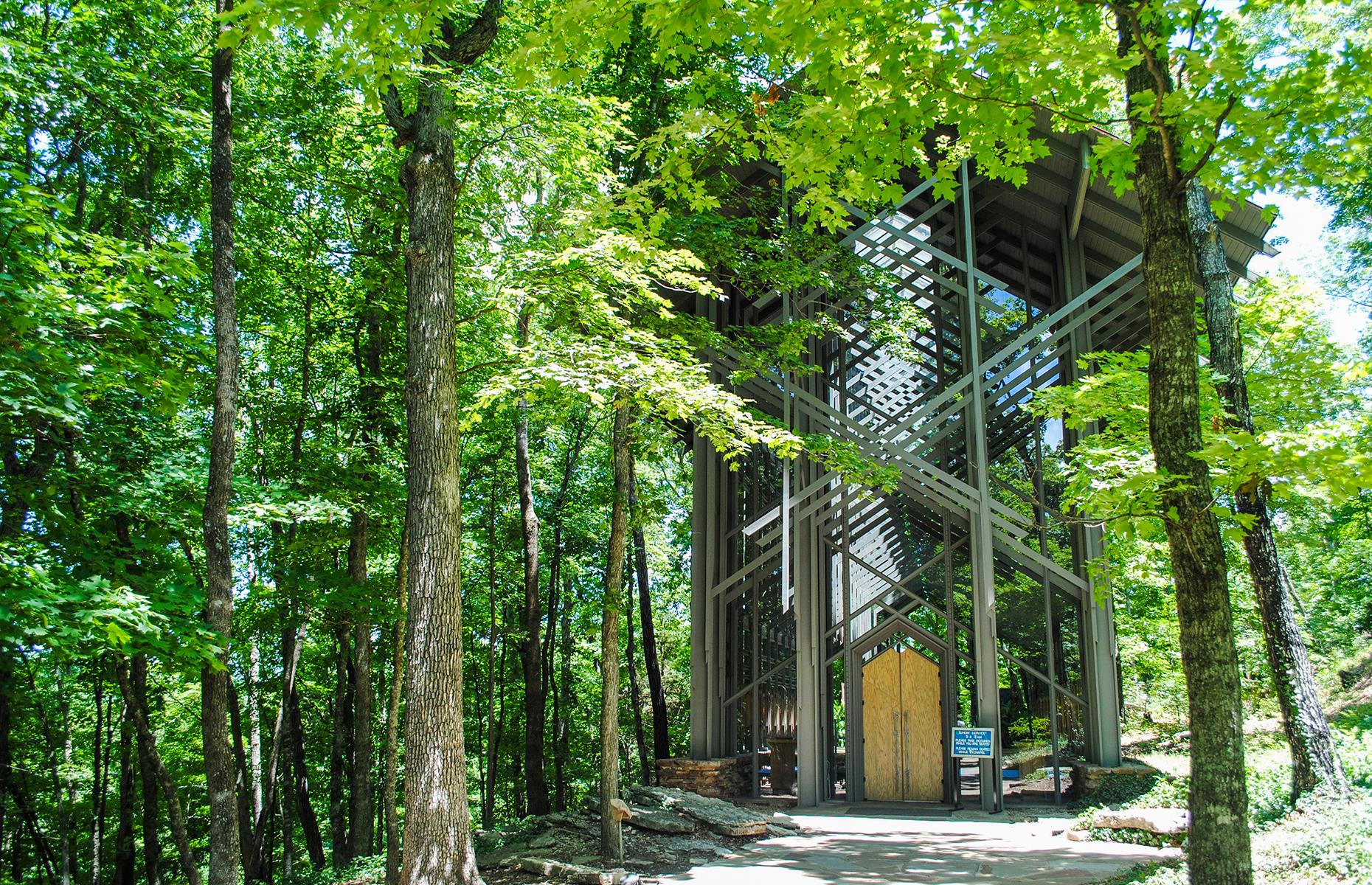 Inspired by Frank Lloyd Wright's Prairie School architecture, the 1980-built Thorncrown Chapel appears to be at one with its natural Ozarks surroundings. It's known for its eye-catching appearance, which features 425 windows set into a wooden frame, and was designed by architect Euine Fay Jones to reflect the landscape. That abundance of glass gives it a spacious, open-air feel.