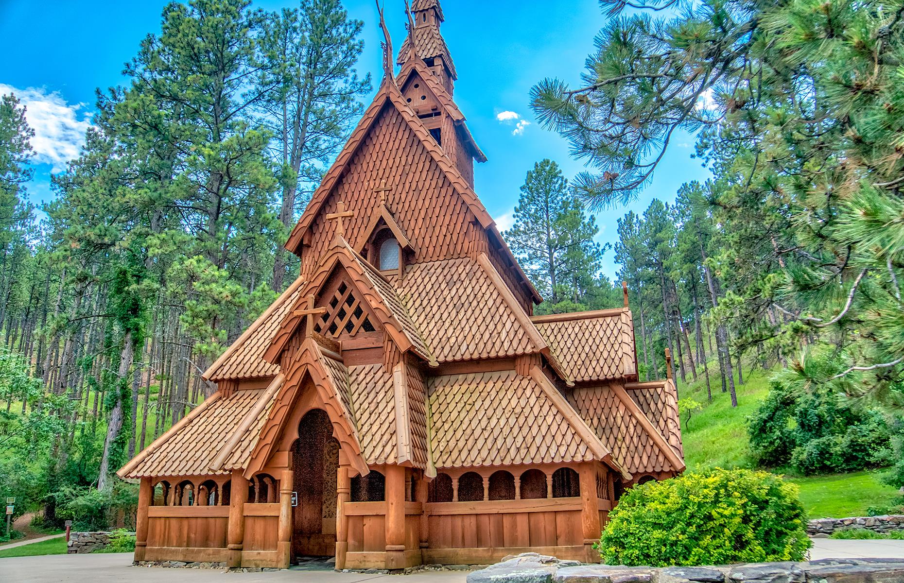 <p>A unique church, reminiscent of fantastical Arendelle in <em>Frozen</em>, this wooden structure is actually based on a traditional Norwegian stave church. The chapel was finished in 1969 and is constructed entirely out of wood, featuring intricate carvings, including a hand-crafted altar and an antique pipe organ. Visitors can not only use it as a place of worship but also learn about the history and traditions of Norwegian stave churches – which they may not expect to do in a place as far away as South Dakota.</p>