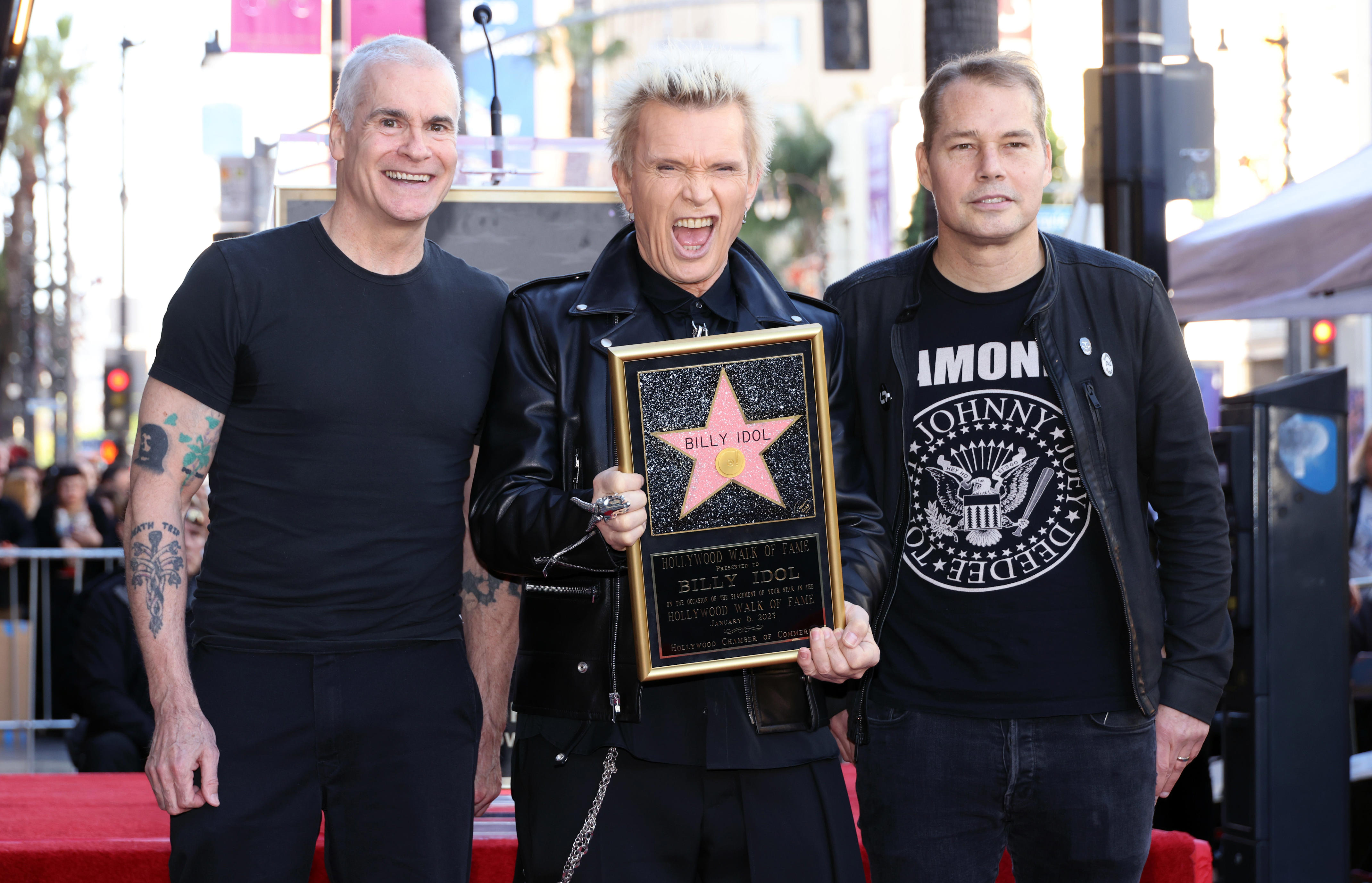 Black Flag singer Henry Rollins (left) and artist Shepard Fairey spoke during Billy Idol's ceremony honoring him with a star on the Hollywood Walk of Fame.