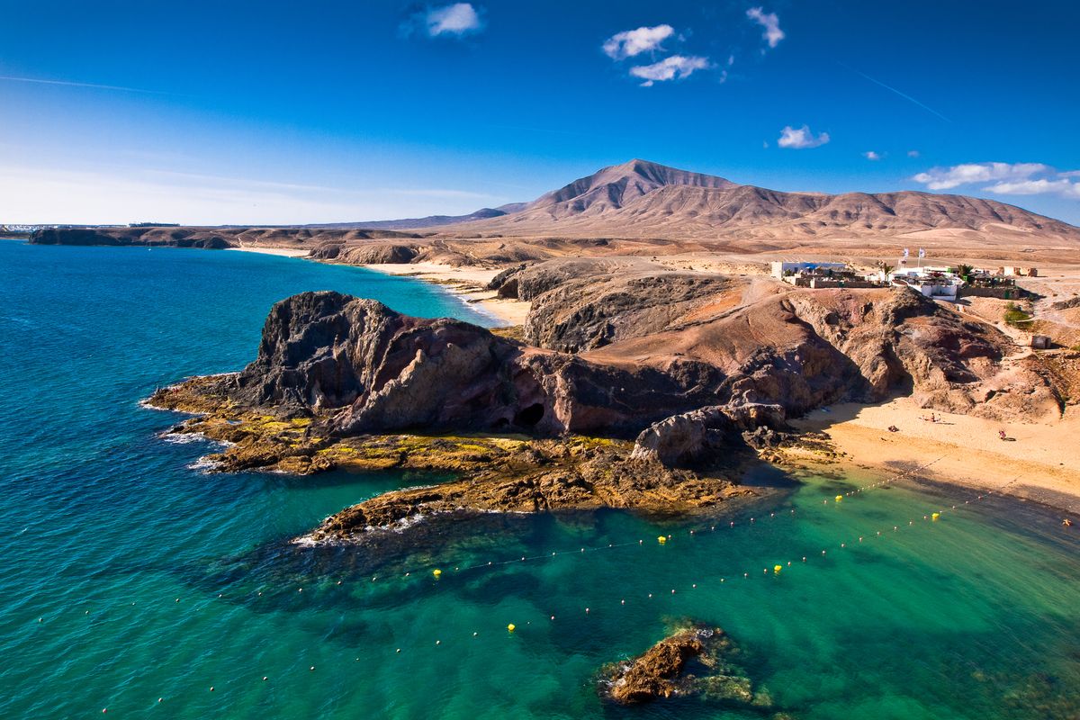<p>For a holiday in Spain with a more dramatic than average landscape, try Lanzarote, with its volcanoes, lava fields, black and red earth, and intriguing rock formations. It also has whitewashed houses, palm groves and, of course, beautiful beaches. Away from the coast, don’t miss the charming villages inland. </p><p>The island has been designated a Biosphere Reserve by UNESCO – to really appreciate the Mars-like scenery, head into the Timanfaya National Park, or book a trip to the Montañas del Fuego (which means Mountains of Fire) to see the volcanic cones, curious geology and lava fields. </p><p><strong>Where to stay:</strong> In the smart Playa del Cable area of the island’s capital Arrecife, <a href="https://www.goodhousekeepingholidays.com/offers/lanzarote-arrecife-hotel-villa-vik">Hotel Villa Vik</a> is an adults-only boutique retreat where you’ll feel like part of the family.</p><p><a class="body-btn-link" href="https://www.goodhousekeepingholidays.com/offers/lanzarote-arrecife-hotel-villa-vik">READ OUR REVIEW AND BOOK A STAY</a></p>