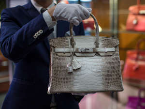  Billionaire Joseph Lau sold $3.2 million worth of luxury handbags at a Sotheby's auction. The Hong Kong mogul has been a fugitive since 2014, when he was convicted of bribery and money laundering. Lau is a prolific collector who's purchased roughly 1,500 Hermès bags, Bloomberg reported. A Hong Kong billionaire just sold $3.2 million worth of Hermès and Chanel handbags at auction.The auction, hosted by Sotheby's, included 77 handbags from the collection of Joseph Lau, a property developer worth roughly $6 billion, according to Bloomberg's Billionaires Index. Titled "the Visionary Collection of Joseph Lau," the auction was part one of a two-part event, the second of which will take place in July, according to Sotheby's.  The collection included one Chanel bag and 76 Hermès bags, including both the iconic Birkin and Kelly styles. The highest bid went to a "Bleu Jean" crocodile Birkin bag produced in 2006, which features 18K white gold and diamond hardware — the bag sold for 1.52 million HKD, or about $194,000, according to Sotheby's website. Other top sellers included a rose mini Kelly bag and another blue crocodile Birkin, both of which sold for 1,206,500 Hong Kong dollars, or about $154,000. Collections of luxury handbags like Lau's could be a smart investment, as their volatility is low and returns could reach mid-single-digits, according to a 2022 Credit Suisse study. And Lau is a prolific handbag collector: He's purchased over 1,500 Hermès bags as gifts over the years, and his family still owns more than 1,000, a representative for Lau told Bloomberg. Lau's collection includes several bags designed by legendary designer Jean-Paul Gaultier, who served as creative director for Hermès from 2004 to 2010. The bags produced during Gaultier's tenure are "highly coveted," according to Sotheby's.Lau's collection extends beyond handbags to diamonds — including a $53 million 12-carat blue diamond — and art by Andy Warhol and Jean-Michel Basquiat, Bloomberg reported. In 2014, Lau was convicted of money laundering and bribery by a Macau court and sentenced to five years in prison, but he's avoided serving time by avoiding travel to the island, which doesn't have an extradition pact with Hong Kong. Lau has auctioned off other pieces in his collection over the years, including $20 million worth of art and fine wine. Take a look at some of the top sellers from Lau's most recent auction: Read the original article on Business Insider