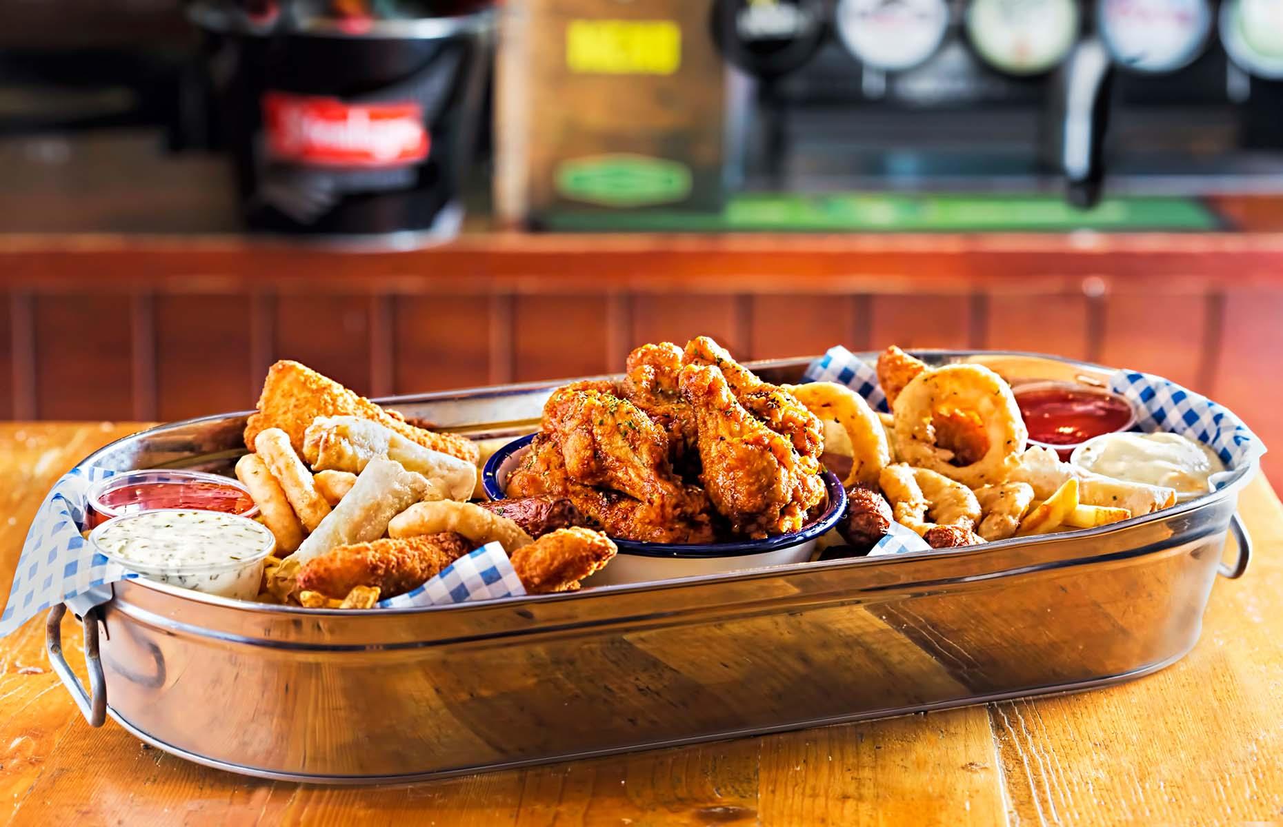 <p>Sometimes, only fried food will do! Cover your board with baking paper and go crazy with the snacks: fries, mozzarella sticks, onion rings, boneless wings, halloumi fries… you can even use an air fryer to make it easier. Serve it with some aioli or dipping sauce, and a selection of cold beers.</p>  <p><a href="https://www.lovefood.com/recipes/110031/golden-oven-fries-recipe"><strong>Get the recipe for golden oven fries and turmeric dipping sauce here</strong></a></p>
