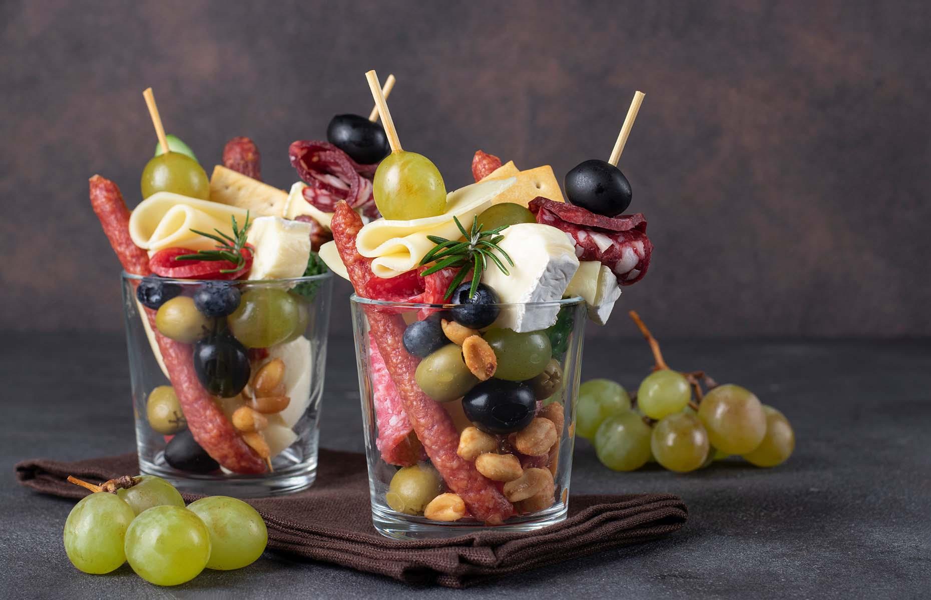 <p>Don't like the idea of everyone dipping (or worse, double-dipping) into the same food? Swap your sharing board for another foodie trend: jarcuterie. With individual servings presented in glasses or jars, every guest will get their own mini-selection of meats and toppings.</p>  <p><a href="https://www.lovefood.com/news/119757/edible-gifts-you-can-make-and-mail-edible-gifts-to-post"><strong>Now get inspired by these edible gifts you can make and mail</strong></a></p>