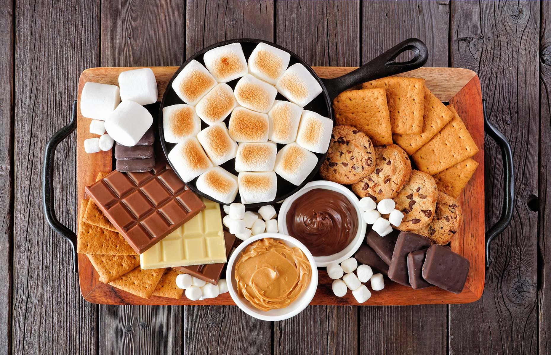 <p>If you've got a sweet tooth, try this grazing board take on an all-American classic dessert. To make it, arrange pots of melted chocolate, graham crackers, and your favourite chocolate bars and biscuits around a selection of baked or torched marshmallows. To get the marshmallows nice and gooey, simply pop them in a small cast-iron pan or cocotte, and place them in a hot oven for a few minutes. Want to make your board extra special? Go all-out by preparing your own flavored marshmallows.</p>  <p><a href="https://www.lovefood.com/recipes/59607/cherry-and-poppy-seed-marshmallows-recipe"><strong>Get the recipe for cherry and poppy seed marshmallows here</strong></a></p>