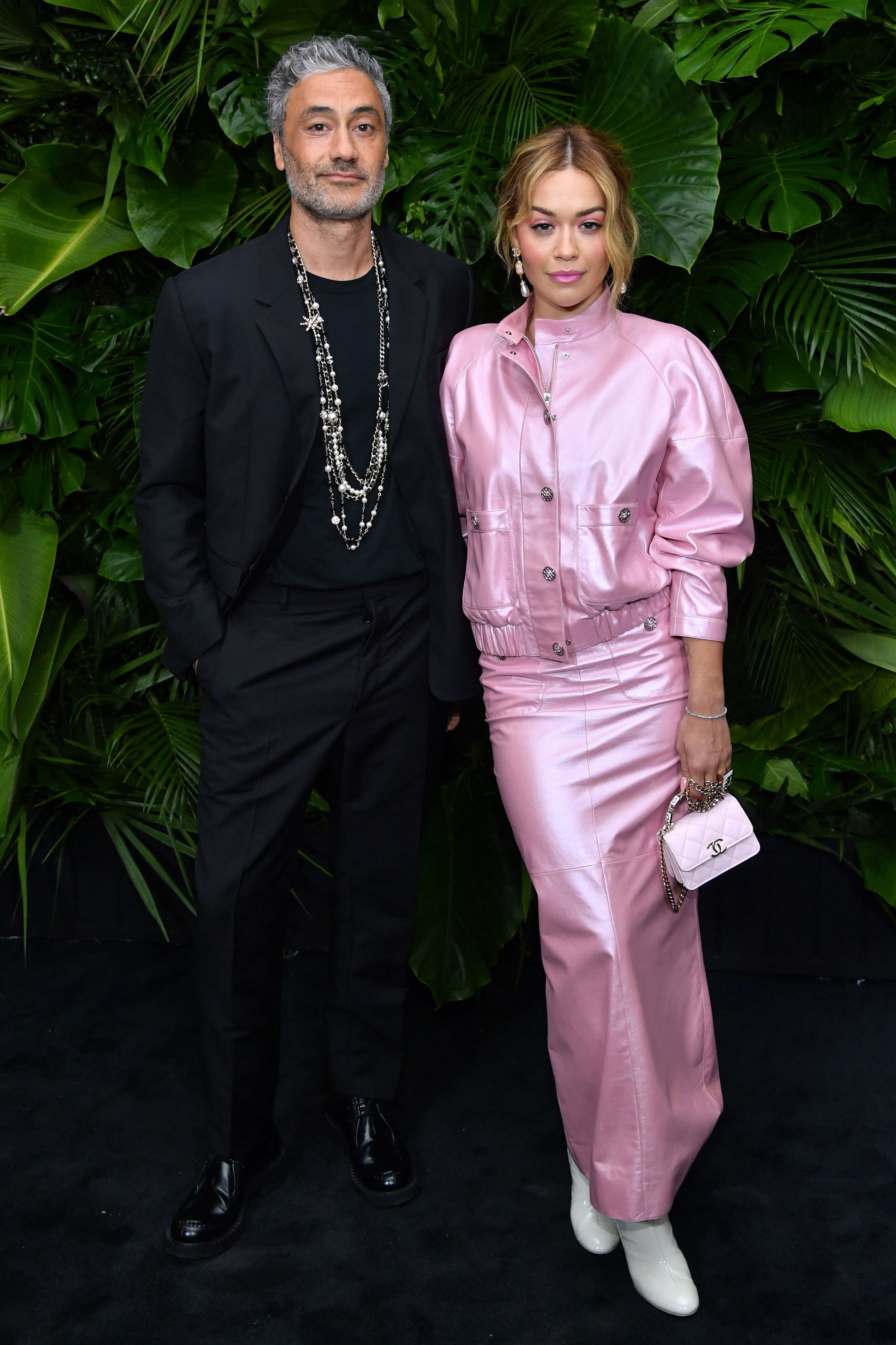 <p><span>Oscar winner Taika Waititi and his wife since 2022, pop singer <a href="https://www.wonderwall.com/celebrity/profiles/overview/rita-ora-1522.article">Rita Ora</a>, have a "Twilight" star to thank for introducing them. "We've actually known each other for years, before we got together [romantically in 2021]," the Marvel filmmaker, writer and actor said on the BBC Two series "Louis Theroux Interviews" in November 2022. "Everyone thinks we met in Australia last year" — after they were photographed looking cozy. But the truth is that they met years earlier. "You know who brought her to my house? Rob Pattinson. He brought her over," Taika explained, as reported by </span><a href="https://www.dailymail.co.uk/tvshowbiz/article-11485895/Rita-Oras-husband-Taika-Waititi-reveals-Robert-Pattinson-played-matchmaker.html">DailyMail.com</a><span>. "I was having a little BBQ and we just got chatting, we hit it off, became friends. Then for the next three and a half years we were just good mates." The "Thor: Ragnarok" and "Jojo Rabbit" writer-director added, "We were in different relationships, and every time we hung out, we would just catch up where we left off, and it was a good friendship, and we decided to ruin it all." </span></p><p>Taika said he likes "the fact that we work hard, and we've both got our own jobs and [are] independent, but are also best friends." He acknowledged that though they're from "different parts of the world — she's from Kosovo and I'm from New Zealand," they have similar backgrounds. "We both grew up poor in working-class families, her dad owned pubs and she hung out in pubs a lot when she was a kid and my mum worked in pubs and a lot of my family enjoy being in pubs so I was in pubs a lot as a kid," he shared, adding, "The background of the Maori communities are quite similar to the Kosovan communities, like our sensibilities are quite aligned, I think."</p>
