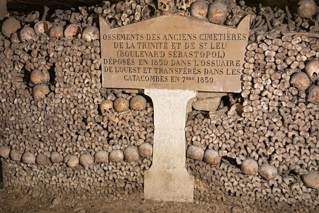 <p><em>By Taylor of Traverse With Taylor</em></p> <p>One of the creepiest famous landmarks to visit around the world is the Catacombs of Paris in Paris, France.</p> <p>It won’t surprise you to know that, like many old European cities, Paris has a network of tunnels running beneath it. Some of these tunnels hold the gruesome remains of Parisians from years past in what are now dubbed the Catacombs of Paris.</p> <p>Back in the 18th-century, overcrowding was causing Paris (and Parisian graveyards) to be hotbeds for plague and disease. In the midst of this, in order to find more space, quarries and labyrinths underneath the city that were once used for mining were transitioned into a place of rest for the dead. </p> <p>Initially called the Paris Municipal Ossuary, the Catacombs of Paris were first used as a bone graveyard in 1785. Cemeteries all over Paris were evacuated, and their bones brought beneath the city. </p> <p>Today, visitors can descend the 131 steps into the catacombs and take an audio guide tour through the stacked bones and skulls. At times, the maze through the bones is extremely small, so backpacks and other items are not recommended! </p> <p>You will be eerily close to the dead during a visit to the Catacombs of Paris, but it is unlike any other experience in Europe and something you must do during any <a href="https://traversewithtaylor.com/weekend-in-paris-itinerary/" rel="noreferrer noopener">visit to Paris</a>!</p>
