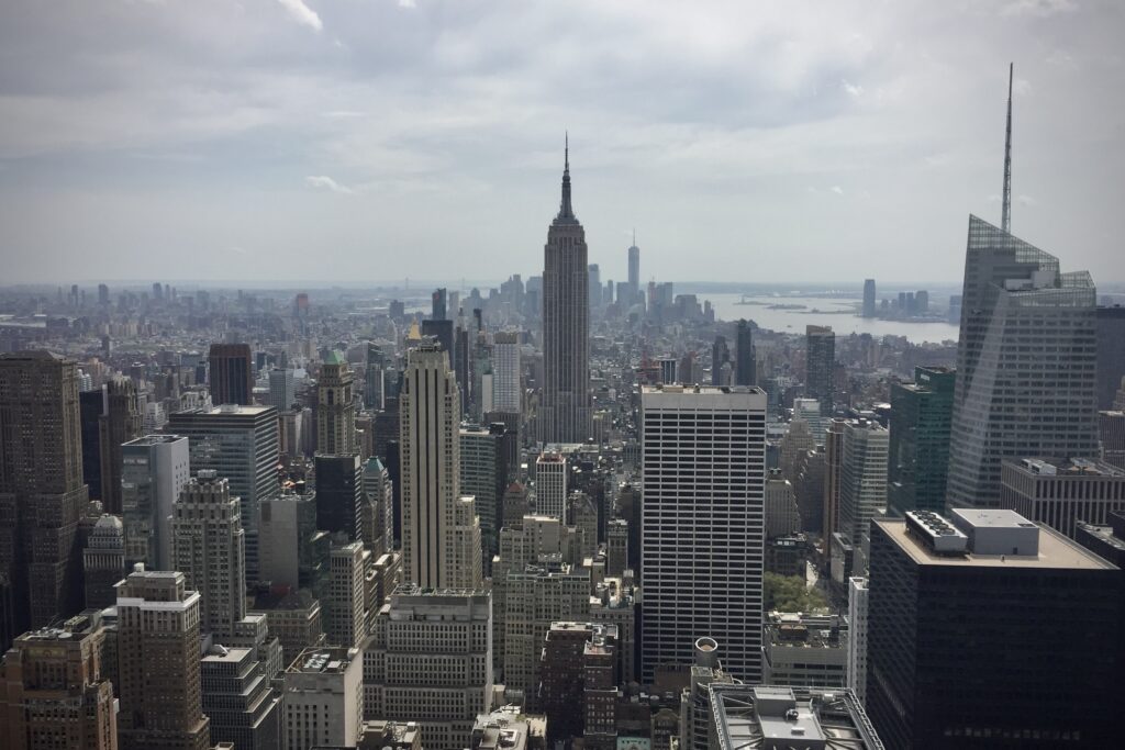 <p><em>By Martha of May Cause Wanderlust </em></p> <p>Although it is no longer the tallest building in the world, the Empire State Building in<a href="https://wanderwithalex.com/things-to-do-in-new-york-city/"> New York City</a>, USA, remains one of the most recognisable landmarks around the world.</p> <p>Occupying a full city block in midtown Manhattan, and standing proud at 102 stories, the Art Deco style Empire State Building is an impressive sight. When it was built in 1931, it eclipsed the Chrysler building as the world's tallest building and held that title until 1970.</p> <p>There are observation decks on the 86<sup>th</sup> and 102<sup>nd</sup> floors, offering panoramic views of New York City and, on a clear day, six states. The top floor observation deck is an iconic place and has played memorable roles in movies like An Affair To Remember (1957) and Sleepless in Seattle (1993) – making it one of the most <a href="https://maycausewanderlust.com/romantic-nyc/" rel="noreferrer noopener">romantic things to do in NYC</a>.</p> <p>However, for a great view that has the Empire State Building in it, head to Top Of The Rock in the Rockefeller Center a few blocks north. </p>
