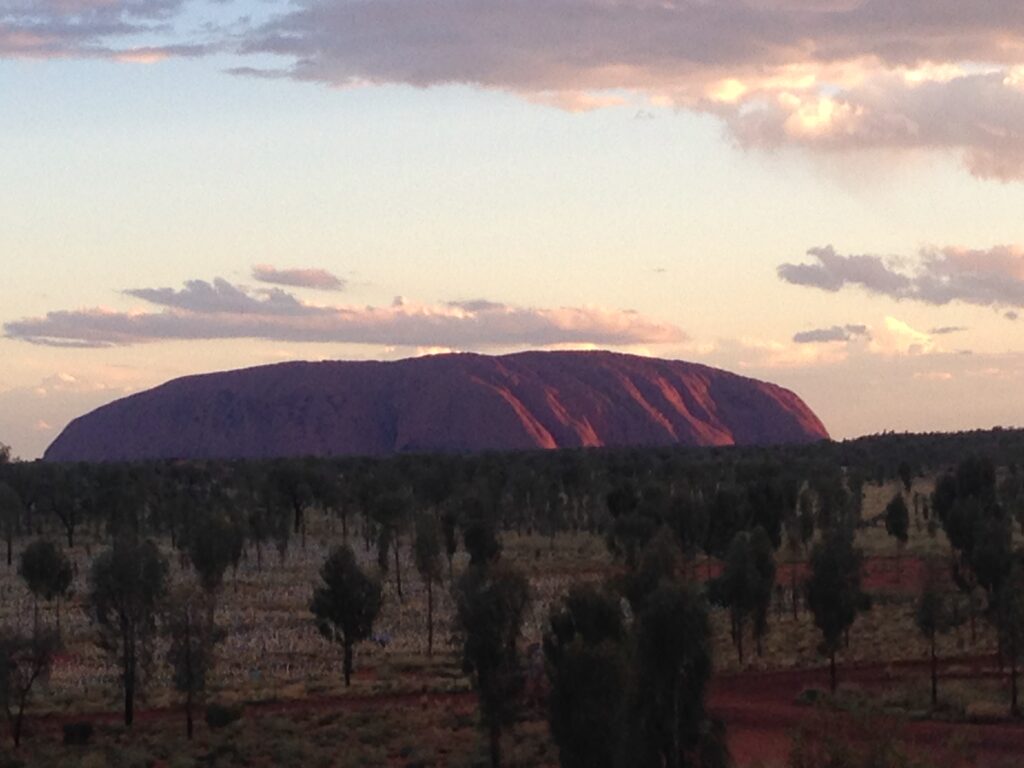 <p><em>By John Dealbreuin of Financial Freedom Countdown</em></p> <p>Uluru, also known as Ayers Rock, is an iconic landmark located in the heart of Australia. It is sacred to the Aboriginal people and is the largest monolith in the world.</p> <p>The giant sandstone rock formation stands 348 meters tall and spans 9.4 km in circumference. It is surrounded by the vast red sand desert that shines bright with various shades of red, orange, and purple during sunsets. Uluru has been a source of spiritual power for Aboriginal people for centuries, providing them with a spiritual connection to their homeland and culture. Archaeological findings showcase that Aboriginal people have resided in this area for over 30,000 years!</p> <p>There are many activities at Uluru, such as exploring the various hiking trails and learning about the Aboriginal culture. Visitors can also learn more about the local flora and fauna by visiting the national park that surrounds Uluru. Home to 21 unique mammals, 73 reptiles, 178 birds, and four desert-dwelling frogs – the park is alive with a remarkable variety of wildlife.</p> <p>“We were lucky to observe the local tribes of Anangu enacting traditional music and dance and narrating Tjukurpa stories. At nightfall, we witnessed the breathtaking view of Uluru illuminated by the stars above,” says John Dealbreuin of <a href="https://financialfreedomcountdown.com/" rel="noreferrer noopener">Financial Freedom Countdown</a>.</p> <p>Uluru is an extraordinary experience not to be missed when traveling through Australia. From its spiritual significance to the physical grandeur of its sandstone formation, Uluru is sure to take your breath away.</p>