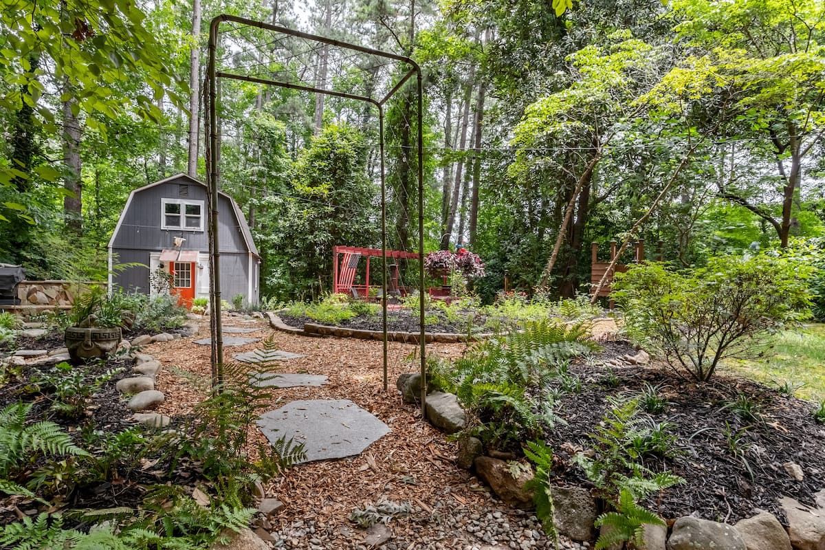 <p>Down the garden stepping stones, surrounded by trees, you’ll find <a href="https://www.airbnb.co.uk/rooms/plus/34979350">this tiny farmhouse</a> in Atlanta. This tiny home is a true escape and a peaceful retreat, featuring a fire pit, hot tub, and option for on-site couple’s massages. </p><p>Inside, the rustic decor matches the stunning surroundings, with shiplap walls and repurposed 250-year-old oak countertops. You won’t want to leave this adorable tiny home!</p>