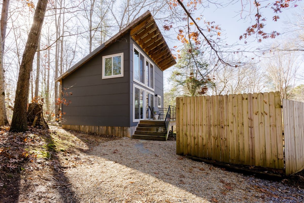 <p>Formerly an artist’s studio, <a href="https://www.airbnb.co.uk/rooms/plus/20268605">Little Sun Bird</a> is a modern tiny home that is flooded with natural light. Surrounded by trees, it has an open-concept layout and deck for enjoying quality time with friends and family.</p><p>Enjoy the peaceful days and mountain air in this tiny home or venture just 15 minutes to downtown Asheville for a hot coffee and delicious food at local hangouts. </p>