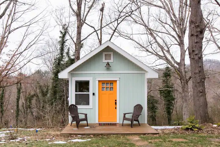 <p>Nestled right on the edge of a wooded property in Nashville, this <a href="https://www.airbnb.co.uk/rooms/plus/22486185">tiny home</a> is perfect for nature lovers. </p><p>This quaint house looks small outside, but inside hides a queen bed, a full kitchen, and a full bathroom. You’ll wake up to birds chirping and can spend some quiet days sitting on the deck admiring the scenery. </p><p>When you want to explore, the tiny home is close to trails that access the beautiful Blue Ridge Parkway and is just five minutes from downtown Ashville. </p>