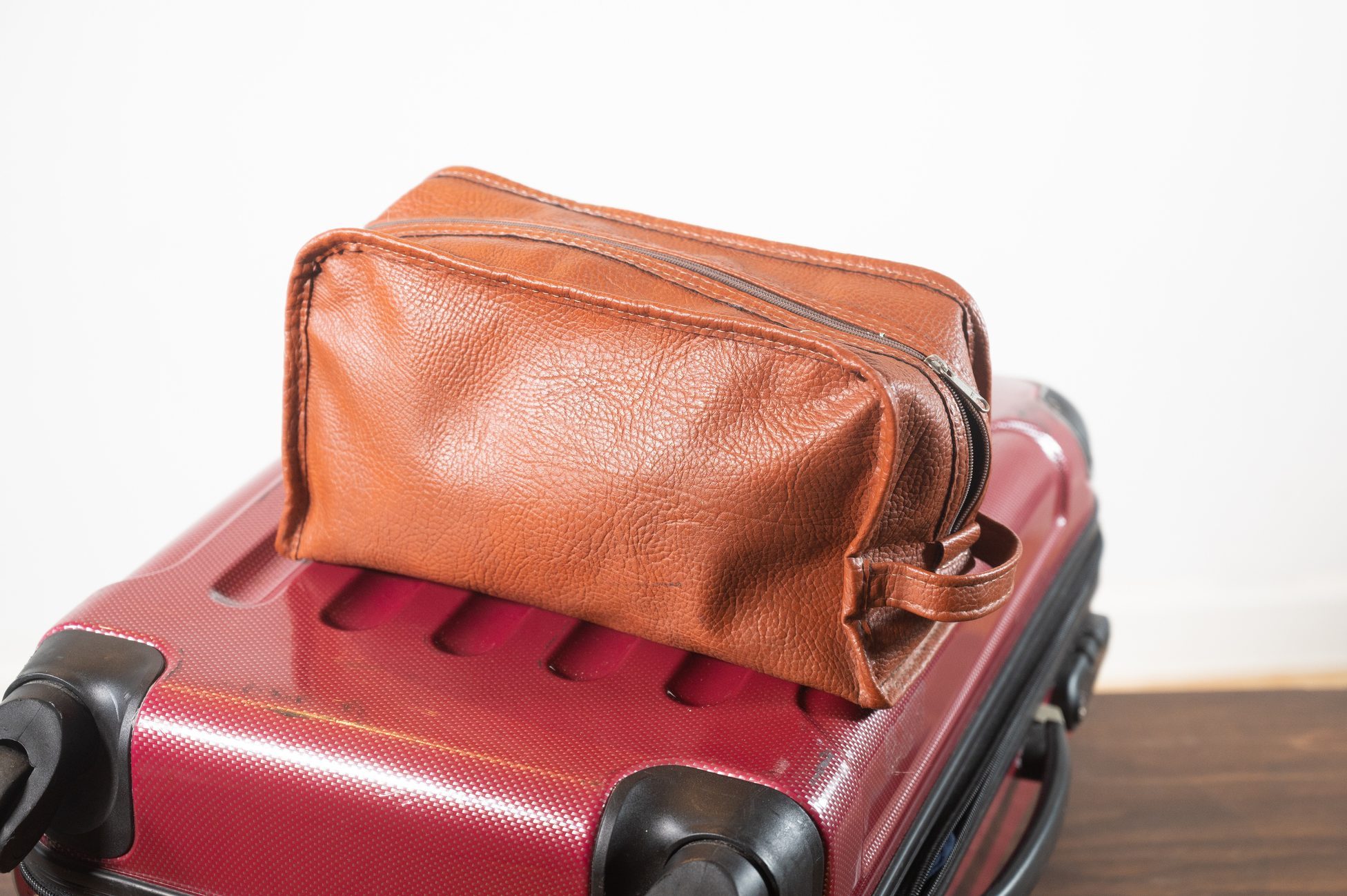 <p>Remember Murphy's Law? "Anything that can go wrong, will go wrong." Put anything that can spill in a separate toiletry bag to avoid damaging your clothes. If you're only taking a carry-on, make sure all your toiletries follow the <a href="https://www.rd.com/article/tsa-carry-on-rules/" rel="noopener noreferrer">TSA carry-on rules</a>, which state that liquids must be 3.4 ounces or less and must all be placed in a one-quart size bag.</p> <p>Keep bulky makeup at home and remember to pack your toiletry bag last so it doesn't get squished under your clothes in a checked bag and so you can remove it quickly when you go through security with a carry-on. A <a href="https://www.amazon.com/Approved-Toiletry-Transparent-Through-Organizer/dp/B01IRYYYHU?th=1" rel="noopener noreferrer">transparent bag</a> not only makes it easier for agents to see what's inside, it's also a top <a href="https://www.rd.com/article/holiday-travel-tips/" rel="noopener noreferrer">travel tip</a> to ace airport security.</p> <p class="listicle-page__cta-button-shop"><a class="shop-btn" href="https://www.amazon.com/Approved-Toiletry-Transparent-Through-Organizer/dp/B01IRYYYHU?th=1">Shop the Toiletry Bag</a></p>