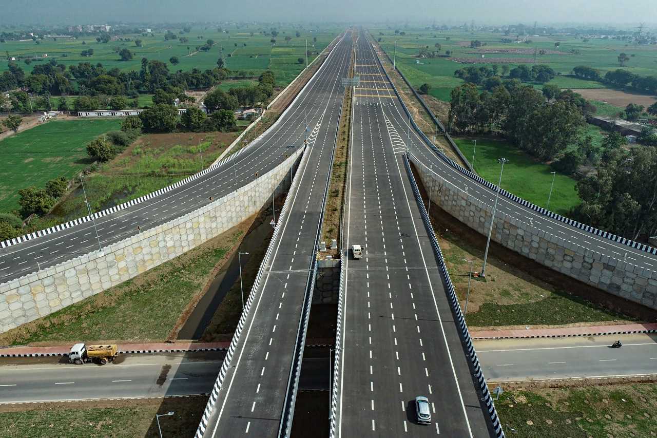 The first section of the 1,386-km eight-lane Delhi-Mumbai Expressway opens for public on February 15. The 246-km Sohna-Dausa stretch was inaugurated on February 12 by Prime Minister Narendra Modi from Dausa, Rajasthan. The stretch will cut the travel time from Delhi to Jaipur to three-and-a-half hours from the five hours, which it took to travel the same distance. Here is all you need to know about the newly-opened Delhi-Mumbai Expressway. (Image: PTI)