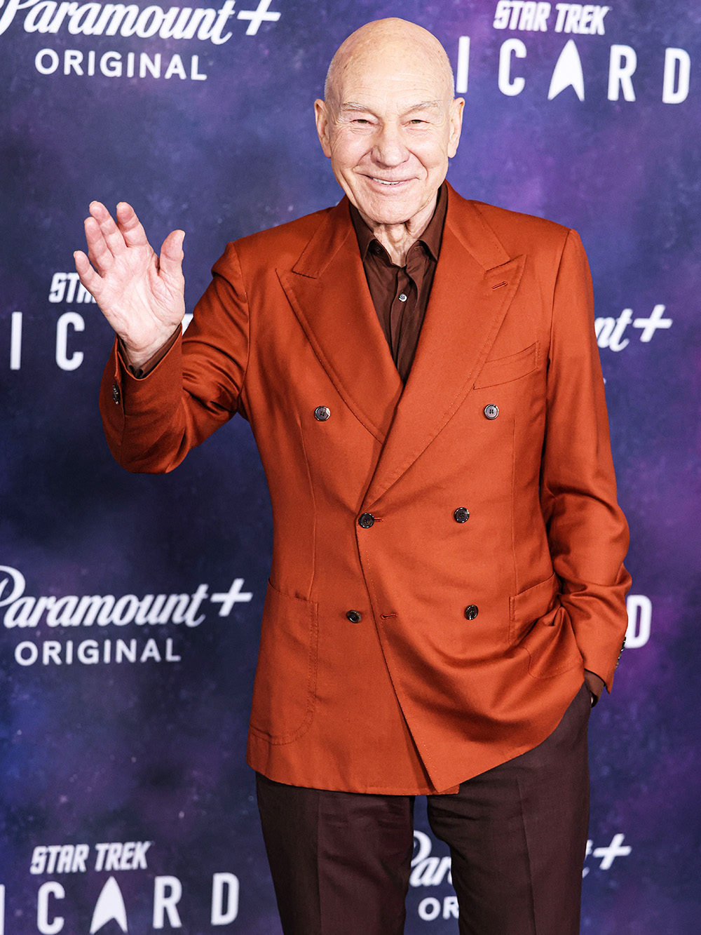 <p>Patrick Stewart was handsome as ever during the premiere of <em>Picard’s </em>third and final season in Hollywood on February 9, 2023. His burnt orange blazer and brown suit practically lit up the red carpet.</p>