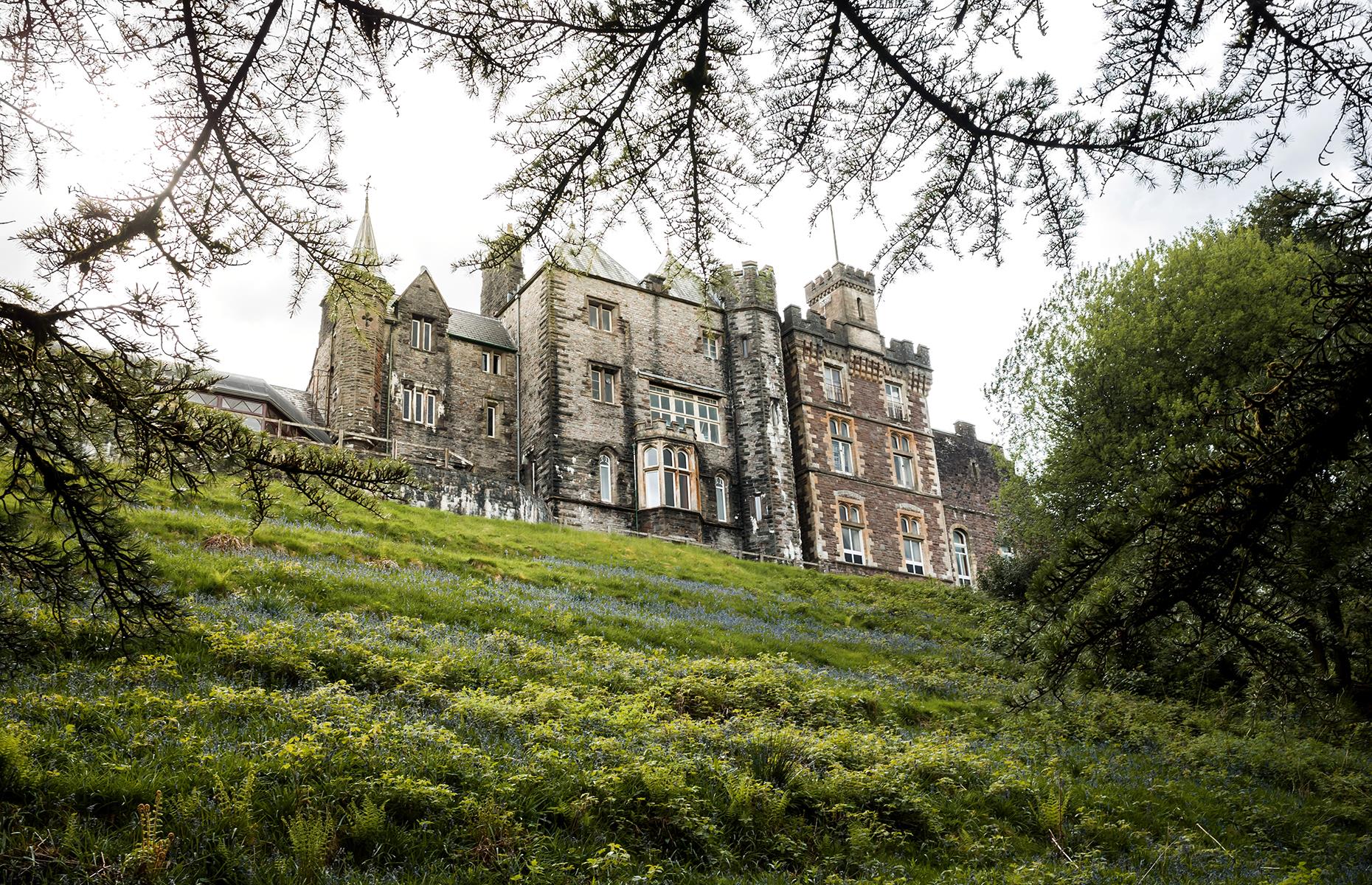 <p>Now a fairy tale-esque wedding venue and hotel, <a href="https://www.craigynoscastle.com/">Craig y Nos Castle</a> stands in the midst of Brecon Beacons National Park and was once the home of Adelina Patti, a famed Italian opera singer. One of the finest spots on the estate is the Patti Theatre, a Grade I-listed building with ornate Corinthian columns, and it's here that the ghost of a lady in black has purportedly been spotted. Ghost tours and private paranormal investigations are available at the haunting site.</p>
