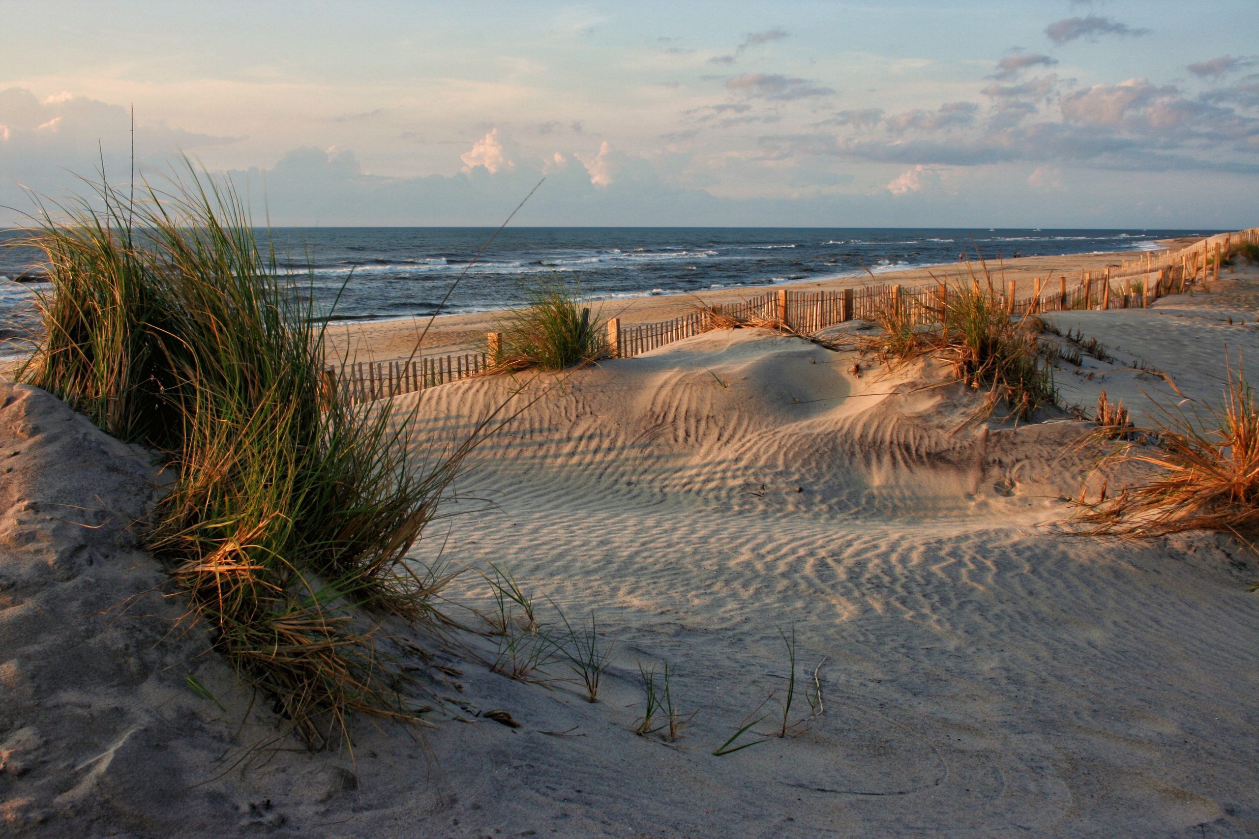 <h3>North America</h3> <p>You’re likely familiar with the Netflix show set on this Atlantic chain of barrier islands, but Outer Banks, North Carolina, makes for one of America’s top cheap places to travel (it's an especially <a href="https://www.rd.com/list/affordable-spring-break-destinations/">affordable spring break destination</a>). Both hotel rooms and vacation rentals tend not to skyrocket during the summer, but they are extra affordable during the offseason. Which means the Outer Banks ends up being the perfect relaxing coastal escape. More than one family or couple? Split the cost of your oceanfront lodging for extra savings.</p> <p>Head there in the spring for pleasant temperatures, deserted beaches, low crowds and inexpensive room rates. If fishing, golfing or horseback riding are your thing, you’re in the right place. Plus, driving along the Outer Banks Scenic Byway allows you views of beautiful beaches, wild horses, lighthouses, birds and more.</p> <p><strong>Sources:</strong></p> <ul> <li><a href="https://www.kayak.com/news/travel-trends-2023/" rel="noopener noreferrer">Kayak</a>: "Travel Trends for 2023"</li> <li class=""><a href="https://www.ustravel.org/sites/default/files/2022-11/us-travel-forecast_fall-2022.pdf" rel="noopener noreferrer">U.S. Travel Association</a>: "U.S. Travel Forecast"</li> <li class=""><a href="https://internationalliving.com/the-cheapest-places-in-the-world-to-live/?utm_source=pr&utm_medium=pr-organic&utm_campaign=press-release" rel="noopener noreferrer">International Living</a>: "The Cheapest Places in the World to Live in 2023"</li> <li class=""><a href="https://www.hometogo.com/media/summer-travel-trends-2022/" rel="noopener noreferrer">Home to Go</a>: "The Summer of Savvy Travel"</li> <li class=""><a href="https://whc.unesco.org/en/list/" rel="noopener noreferrer">UNESCO</a>: "World Heritage List"</li> <li class=""><a href="https://www.money.co.uk/loans/luxury-on-a-budget" rel="noopener noreferrer">Money.co.uk</a>: "Luxury on a Budget"</li> <li class=""><a href="https://www.omio.co.uk/c/cheap-travel-europe/" rel="noopener noreferrer">Omio</a>: "The Best Travel Destinations in Europe for Travellers on a Budget"</li> <li class=""><a href="https://www.travellens.co/us-staycation-index/" rel="noopener noreferrer">Travel Lens</a>: "U.S. Staycation Index"</li> <li><a href="https://www.hometogo.com" rel="noopener">Home to Go</a></li> </ul>